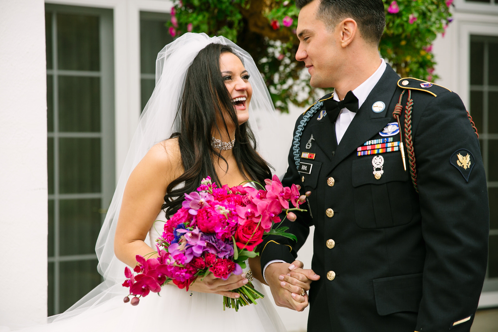 bride and groom smiling together