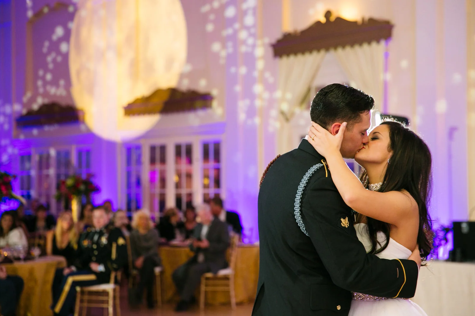 bride and groom kiss at their wedding