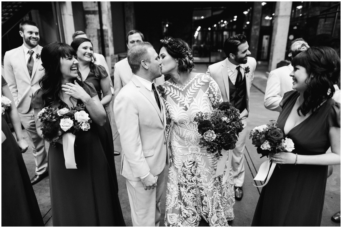 Bridal party celebrating the bride and groom