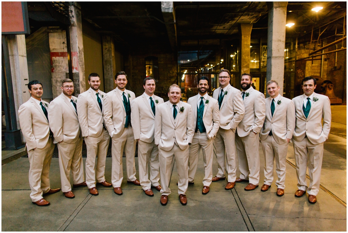  Groom and his groomsmen with greenery tie and boutonniere  