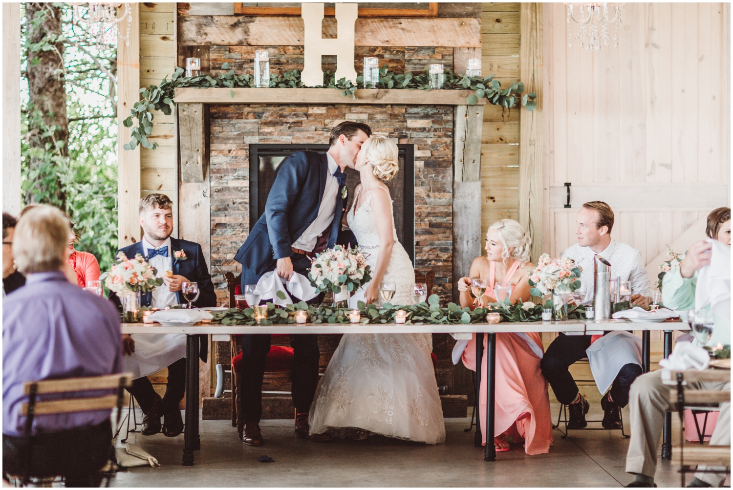 bride and groom kiss