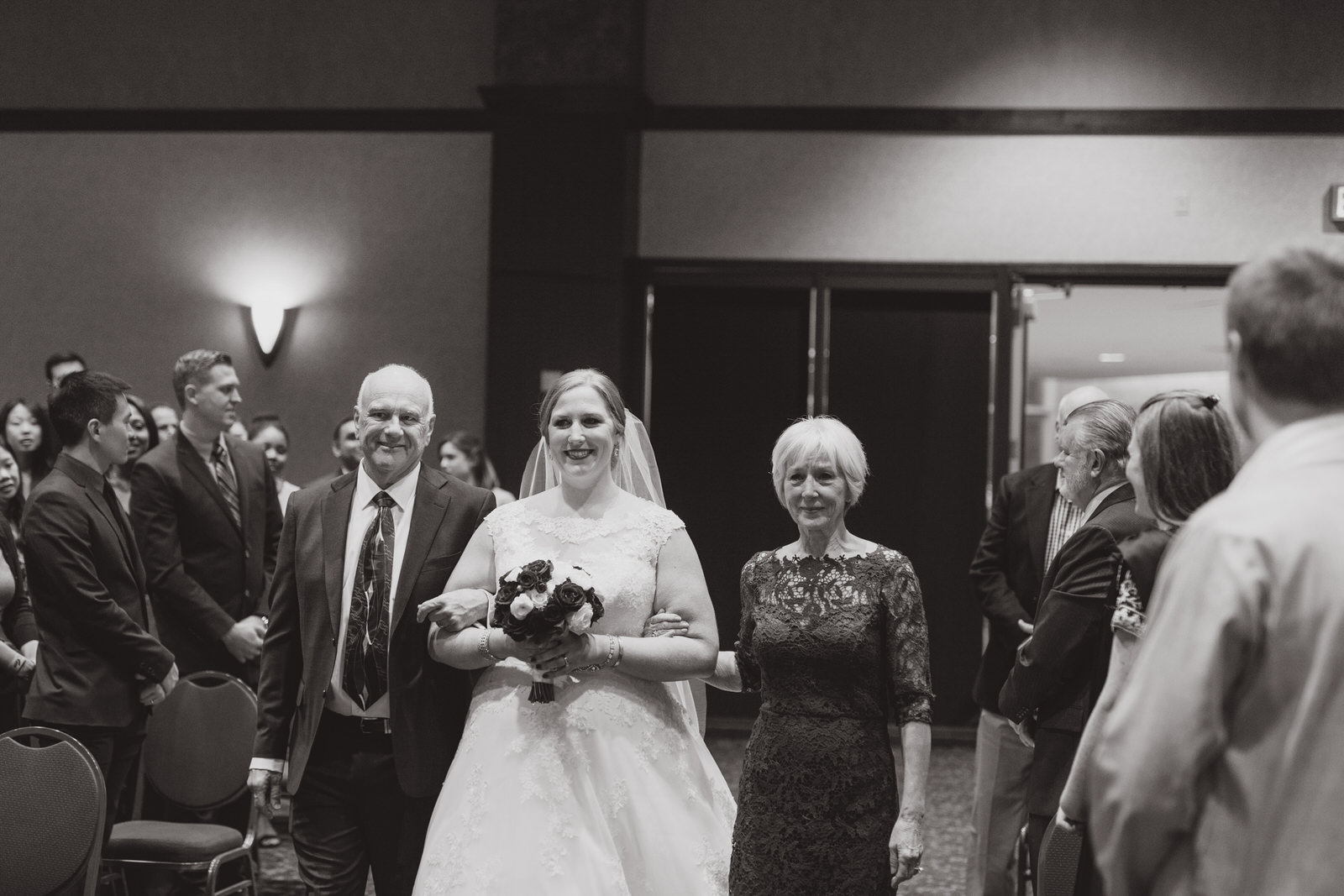  parents walking bride down the aisle 