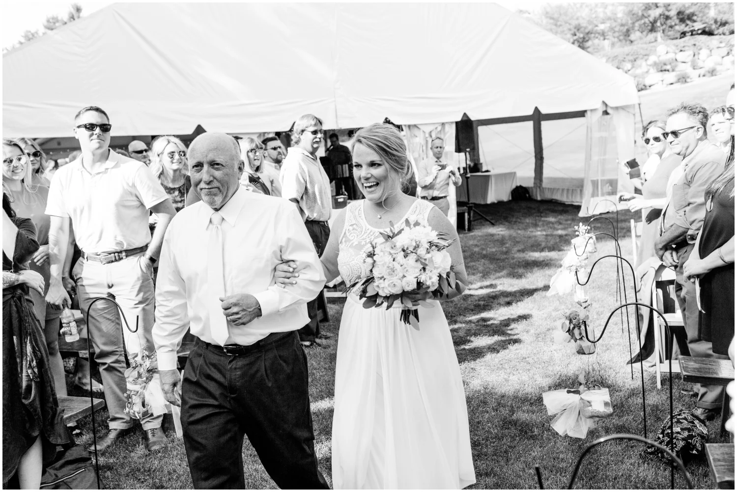 Bride and father walking down the aisle