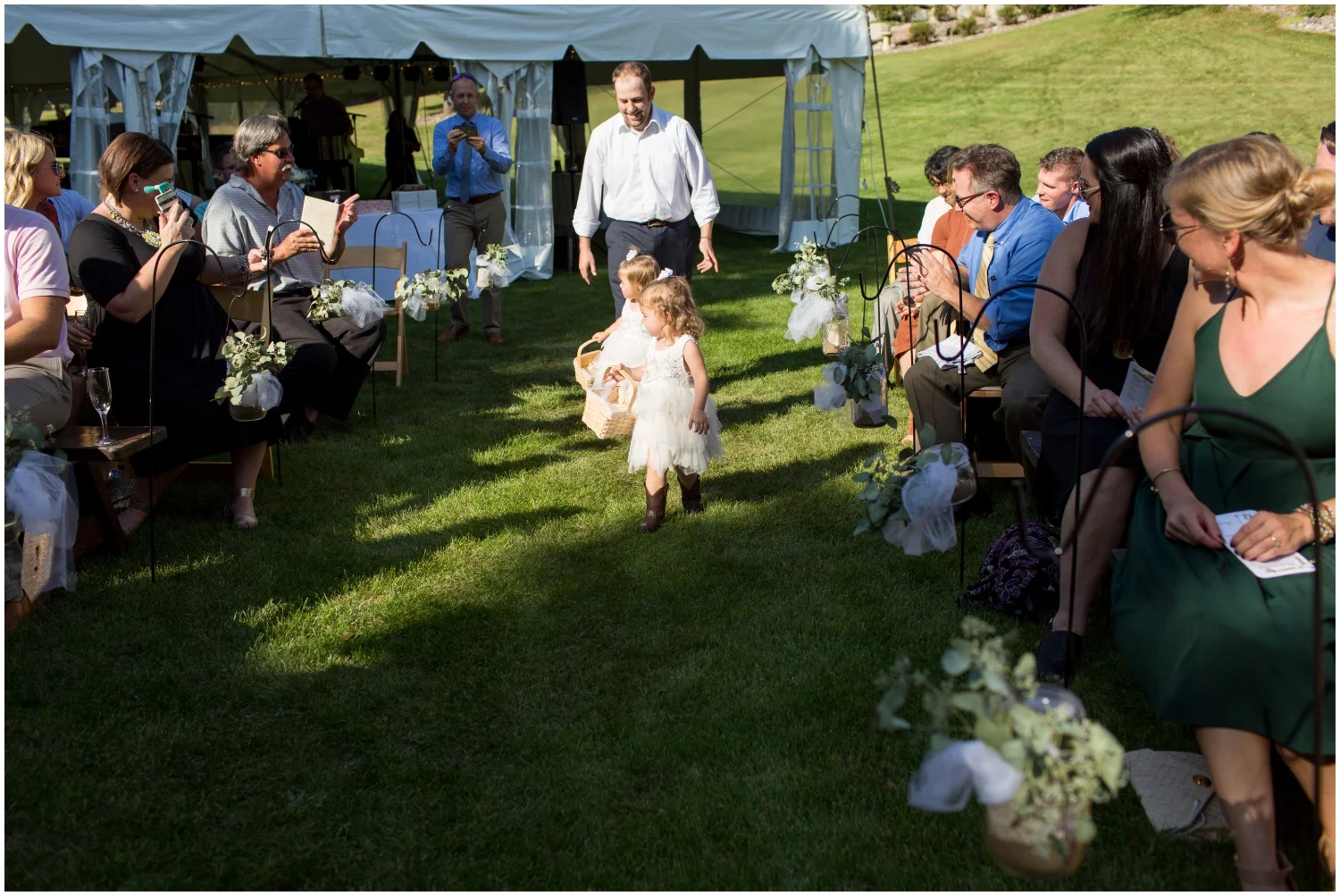 Little Flower girls walking down the aisle