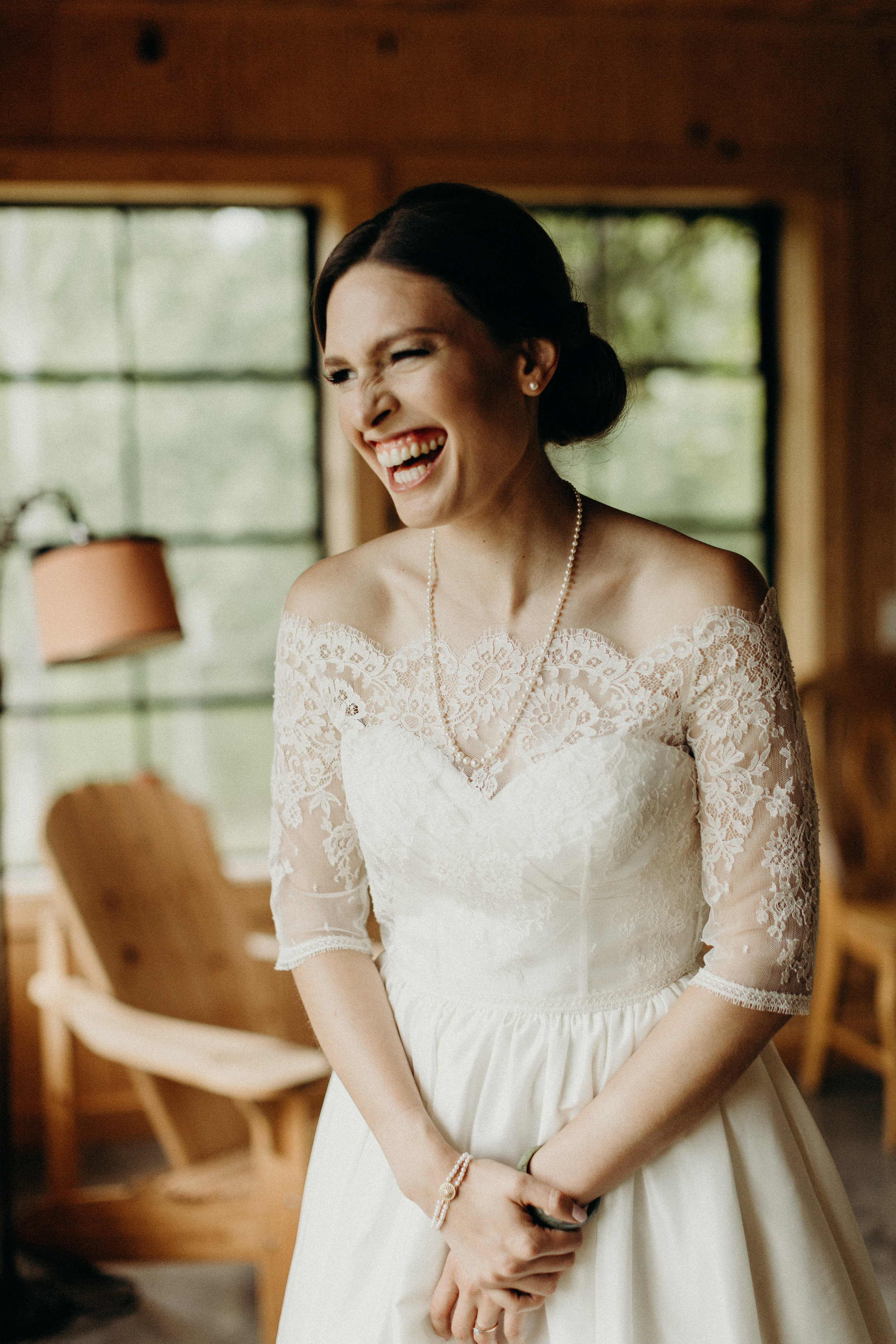  Bride smiling on her wedding dress 