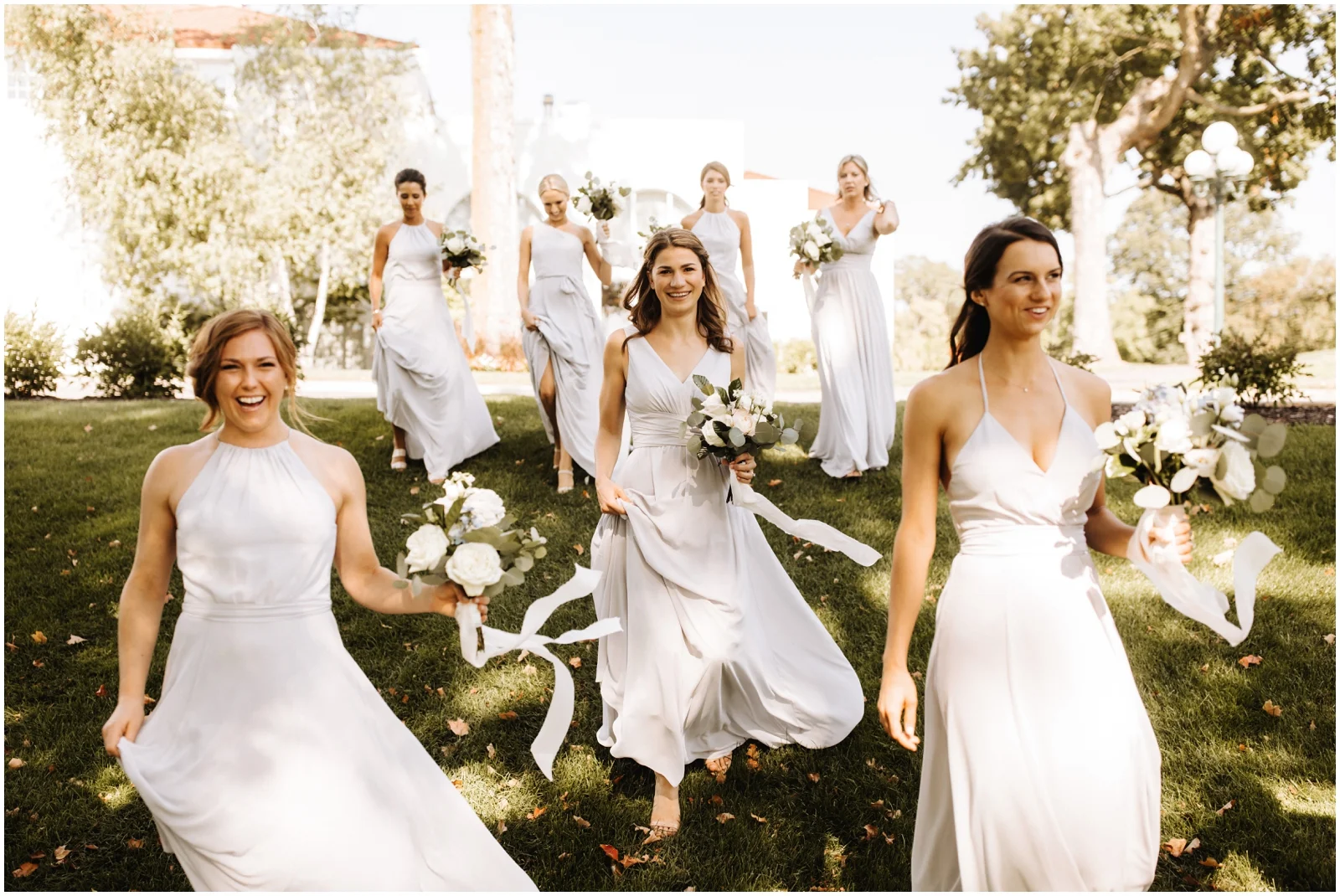 Minnesota Wedding Planner. Lafayette Club Wedding. Bride and the bridesmaids holding their bridal bouquets