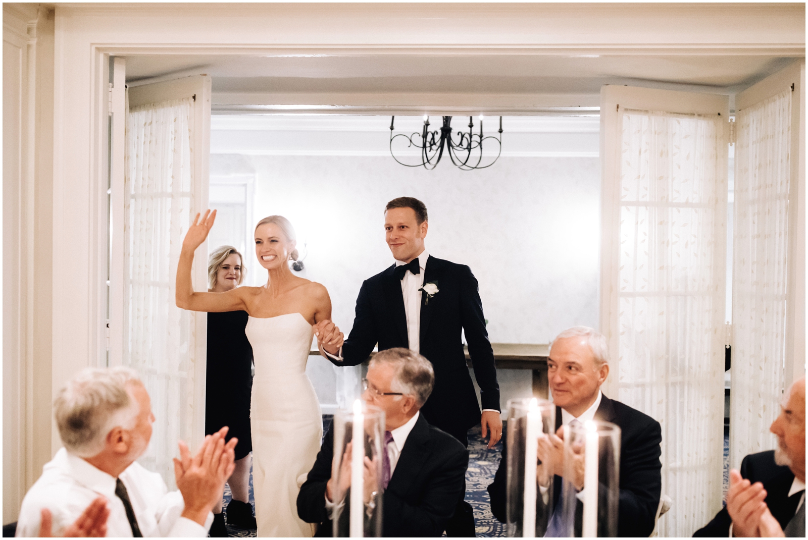  Minnesota Wedding Planner. Lafayette Club Wedding. Wedding Reception Inspiration. Wedding Decor. Greenery Wedding. Bride and groom walking into the reception 