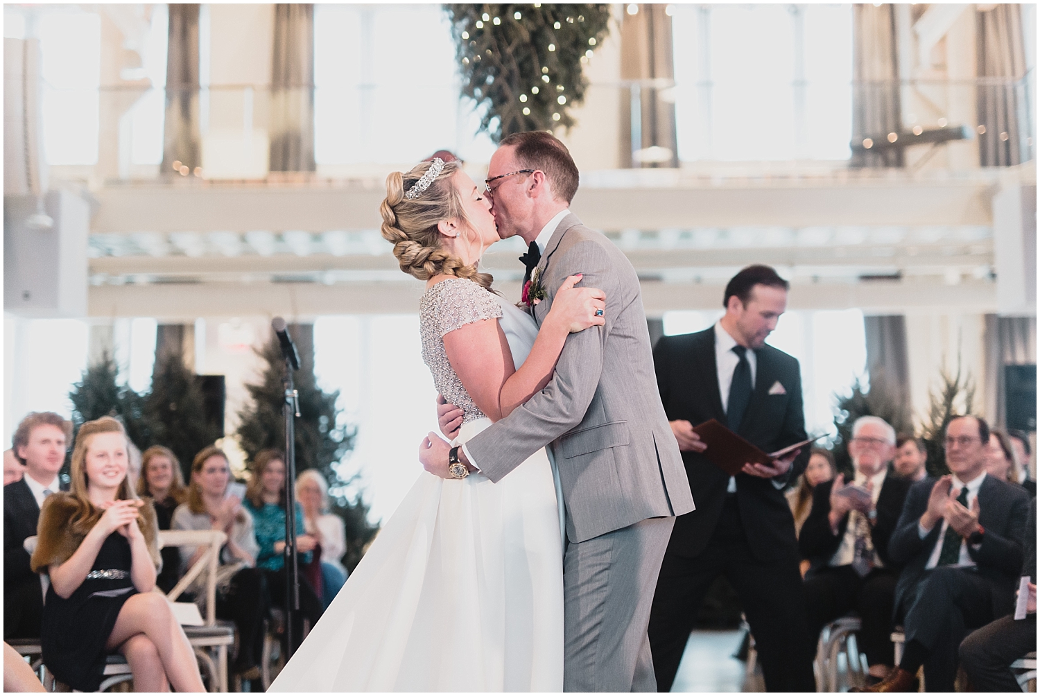  Minnesota Wedding Planner, Mpls Wedding Planner, Machine Shop MPLS, Mpls Wedding Venue,   Bride and groom kiss at their wedding ceremony 