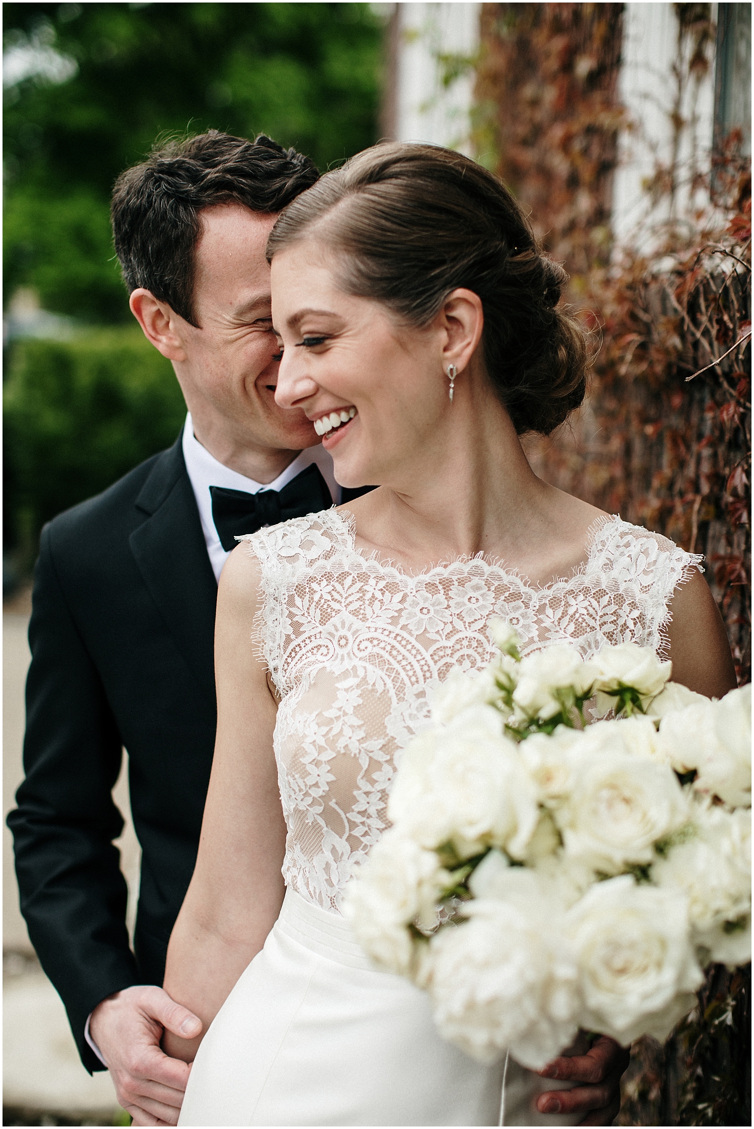 Bride and groom smile before their wedding in Blaisdell
