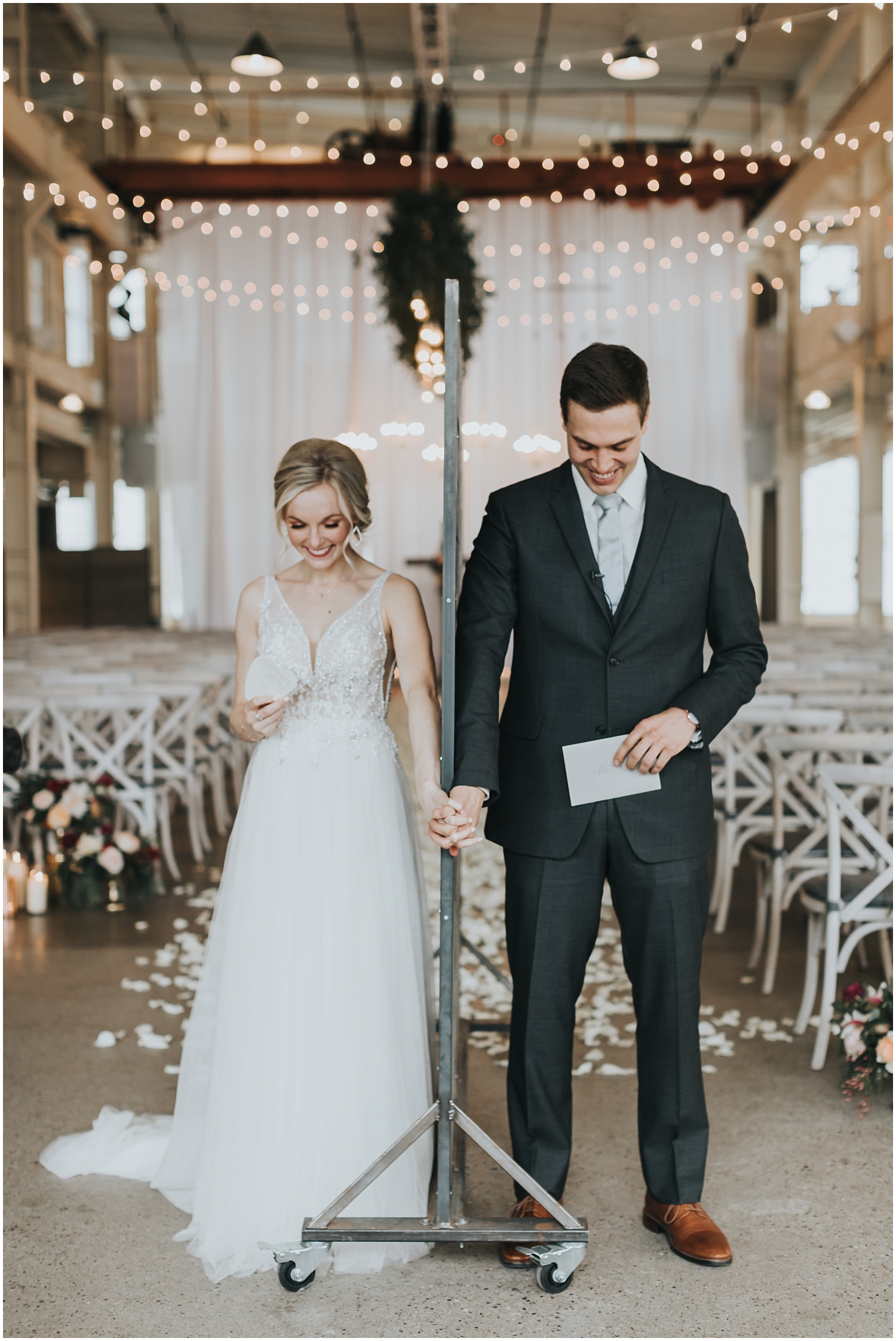  bride and groom holding hands before their wedding ceremony 