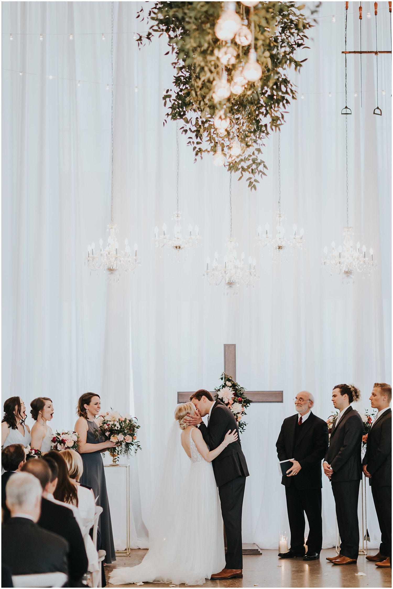  bride and groom say I do at their MPLS wedding ceremony 