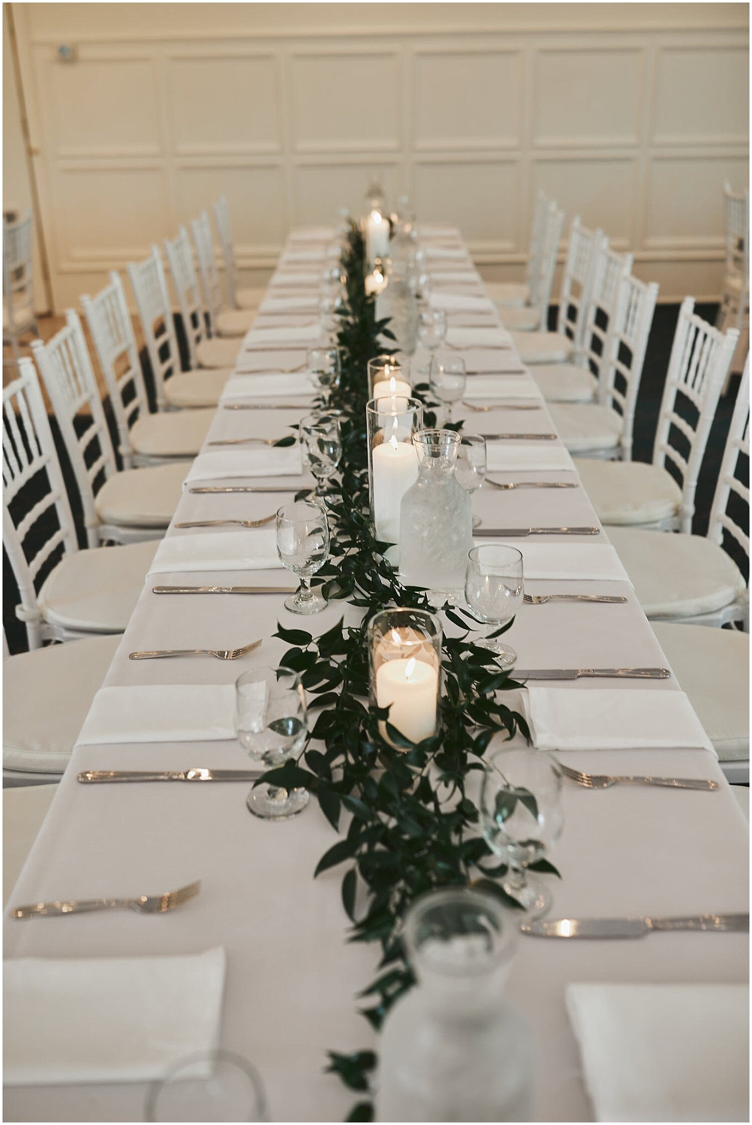  white and greenery wedding tablescape 