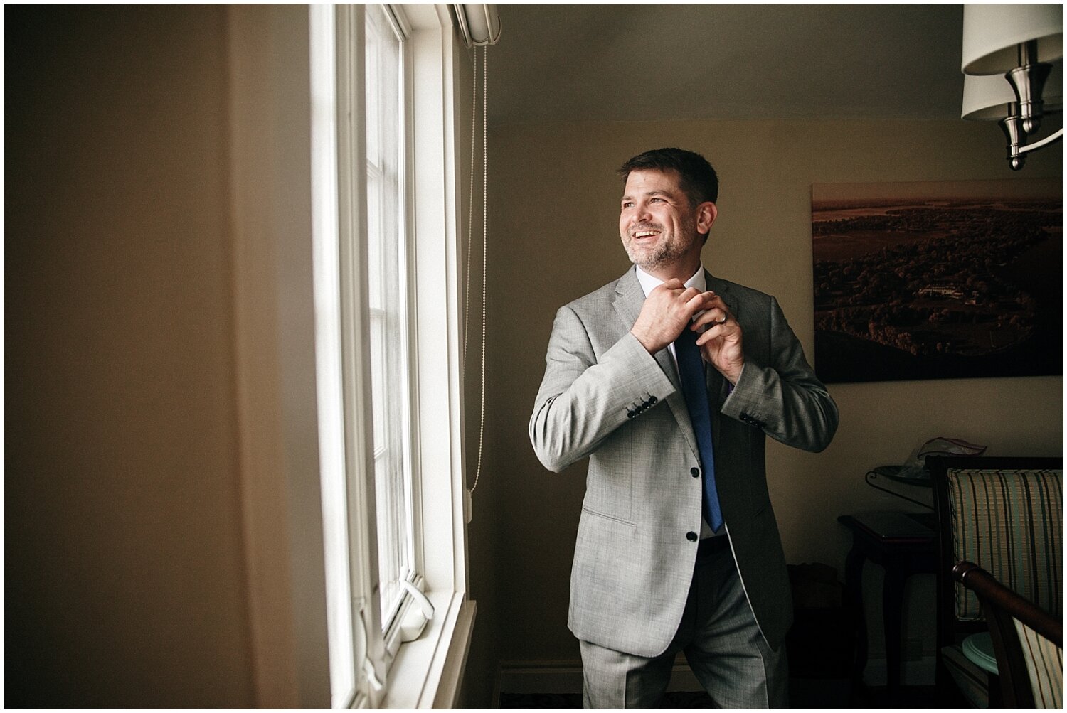  groom getting ready for his wedding in MN 