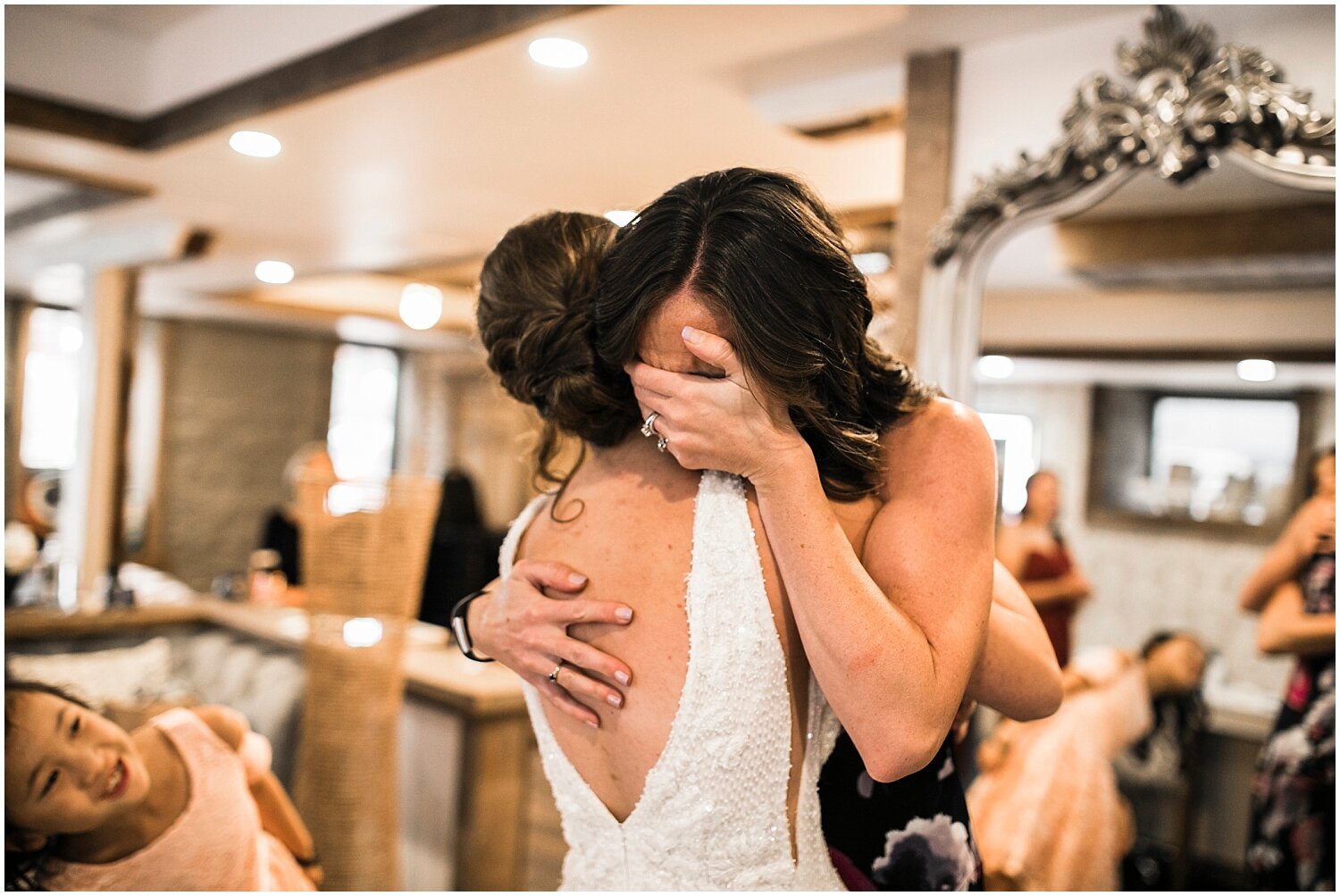  bride and mother getting emotional before the wedding 