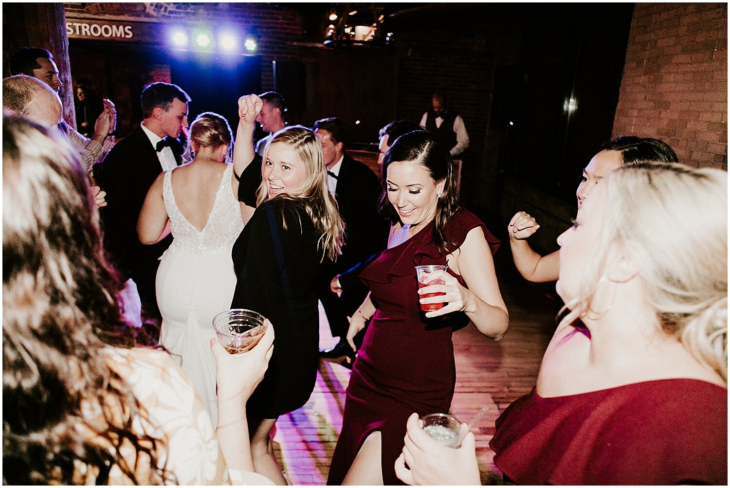  wedding guests dancing at the reception in Minneapolis event center 