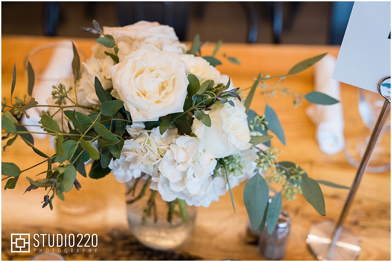  Small white floral centerpiece for wedding reception 
