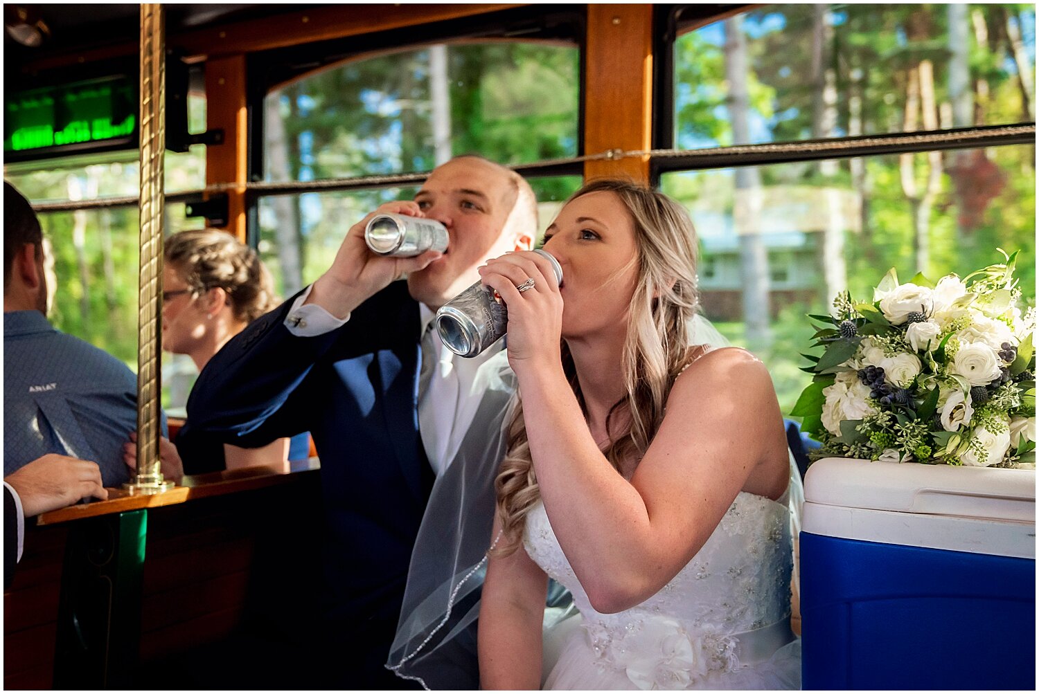  bride and groom drinking beer 