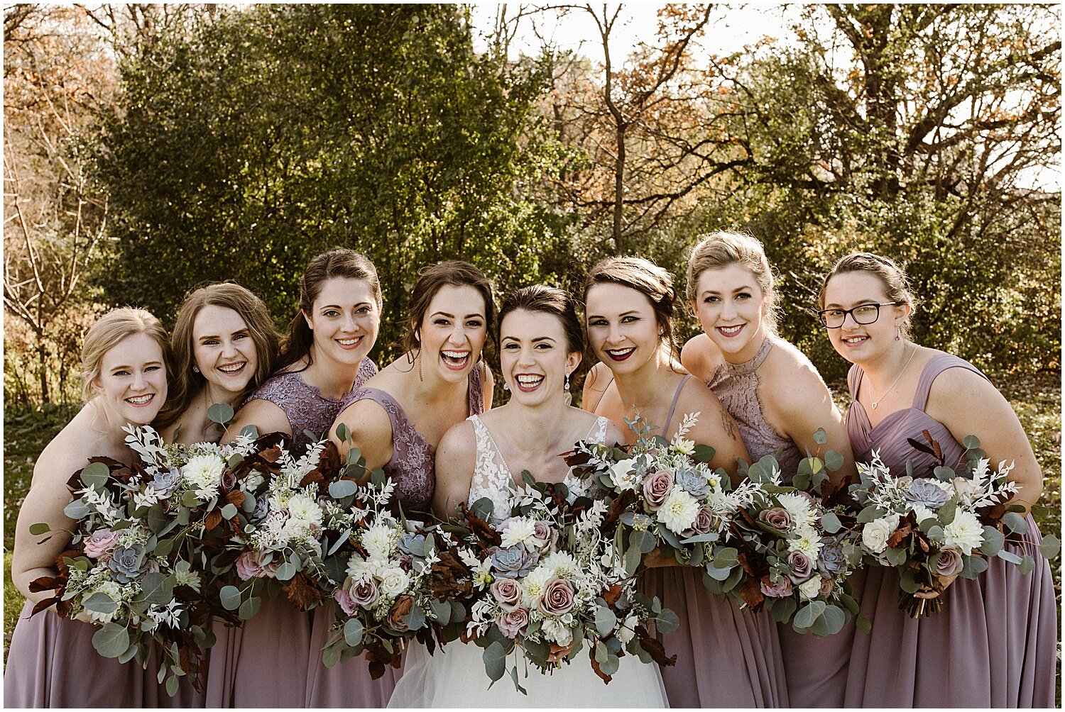  bride and bridesmaids holding their wedding bouquet 