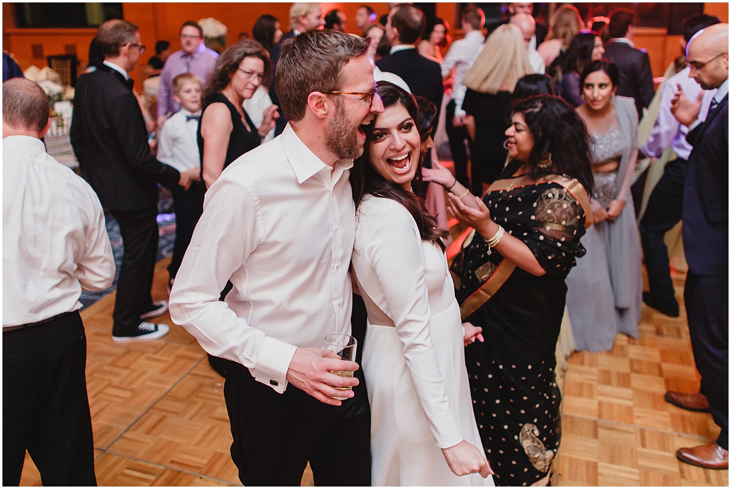  bride and groom dancing in their wedding reception 