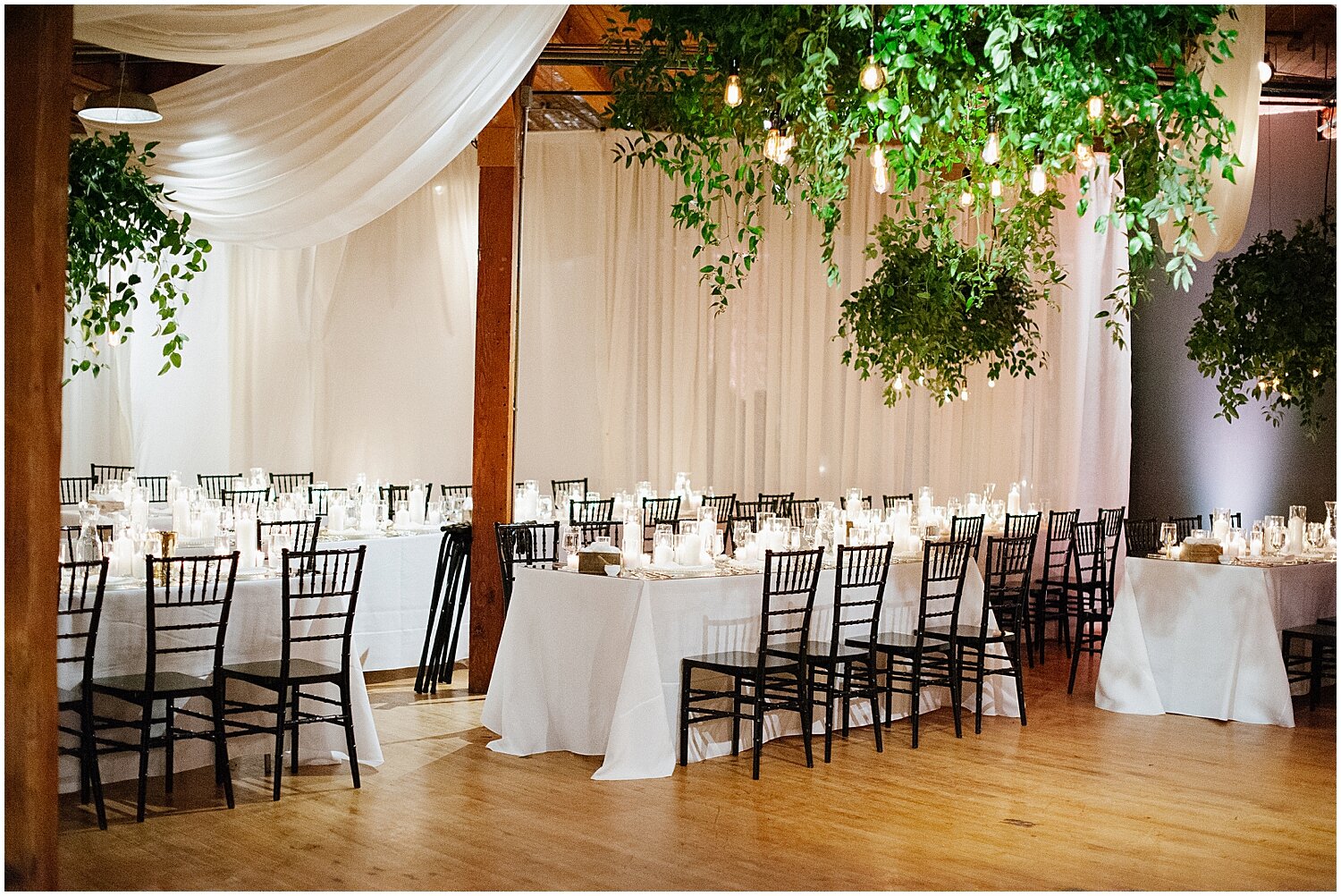  greenery decor and ivory drapes 