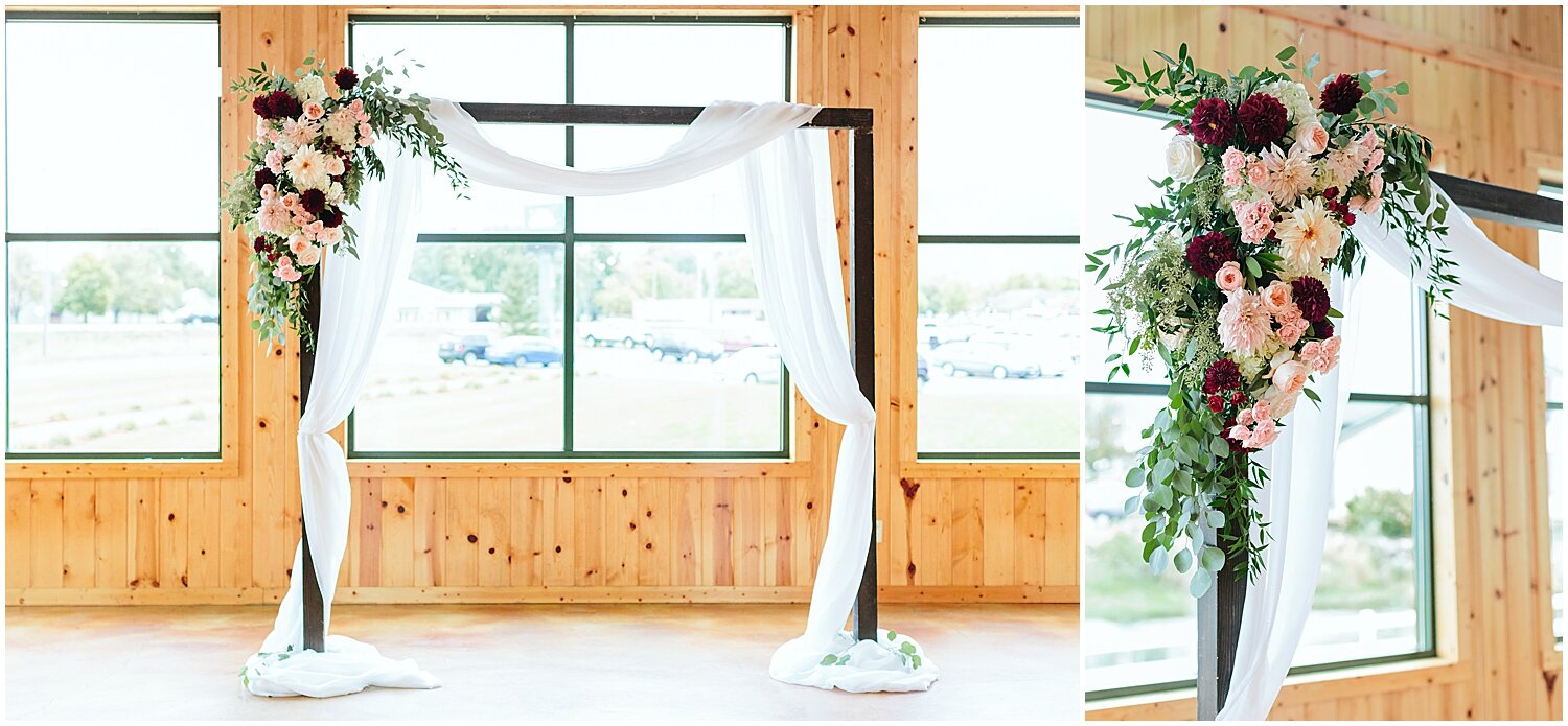  wedding arch with drapes and floral 