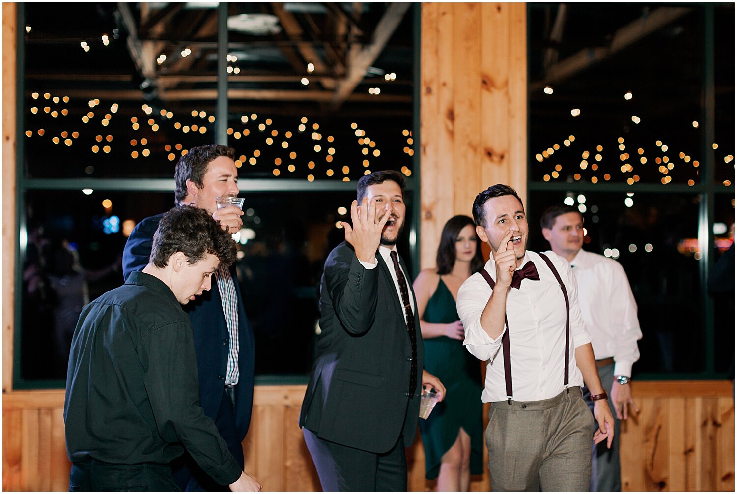  groom and groomsmen singing in mn wedding 
