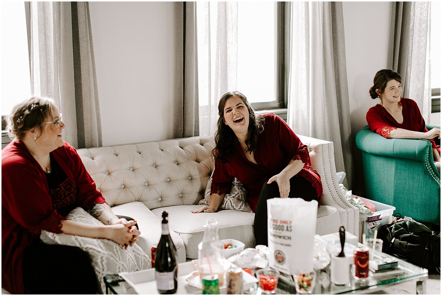  bridesmaids laughing before Minneapolis wedding 