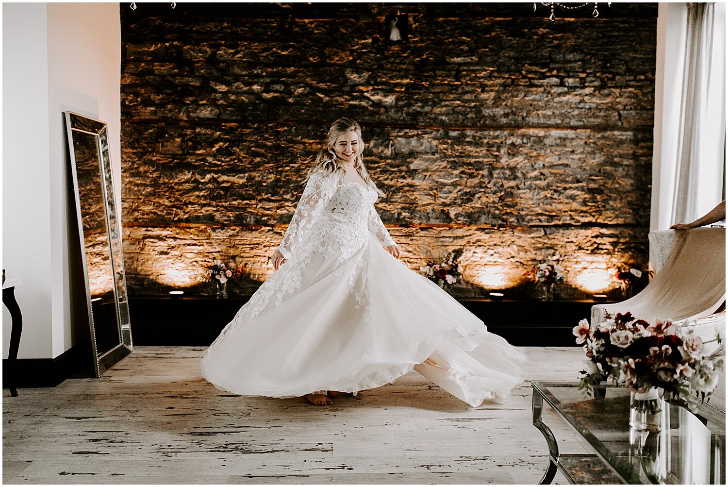  bride twirling while wearing her wedding dress 