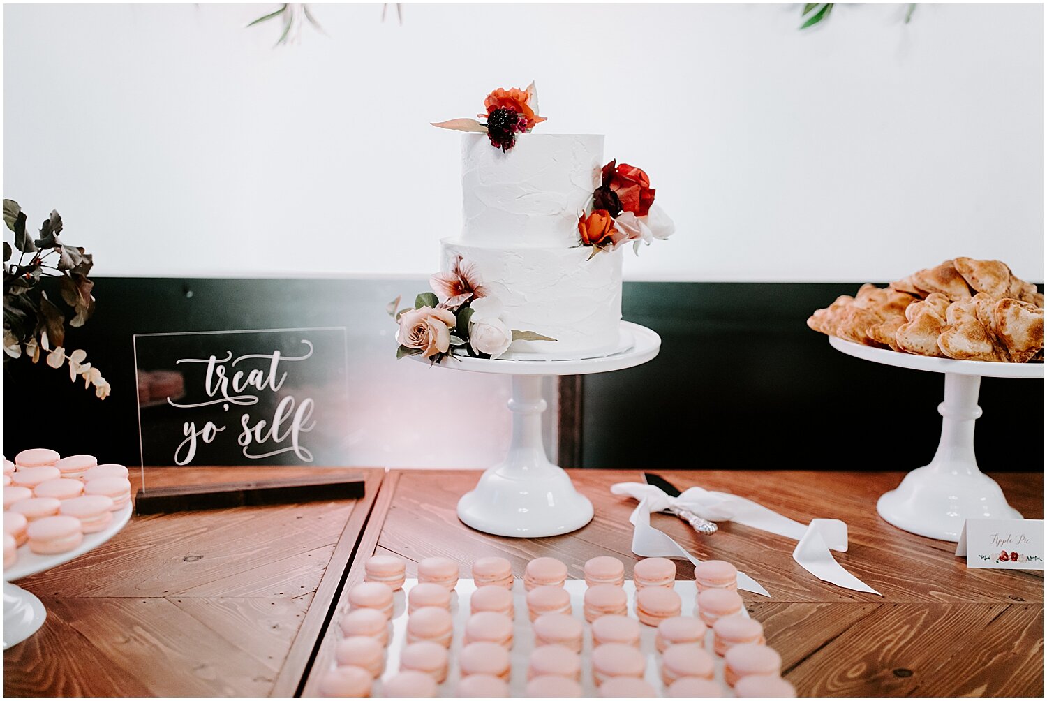  small white wedding cake and dessert table 