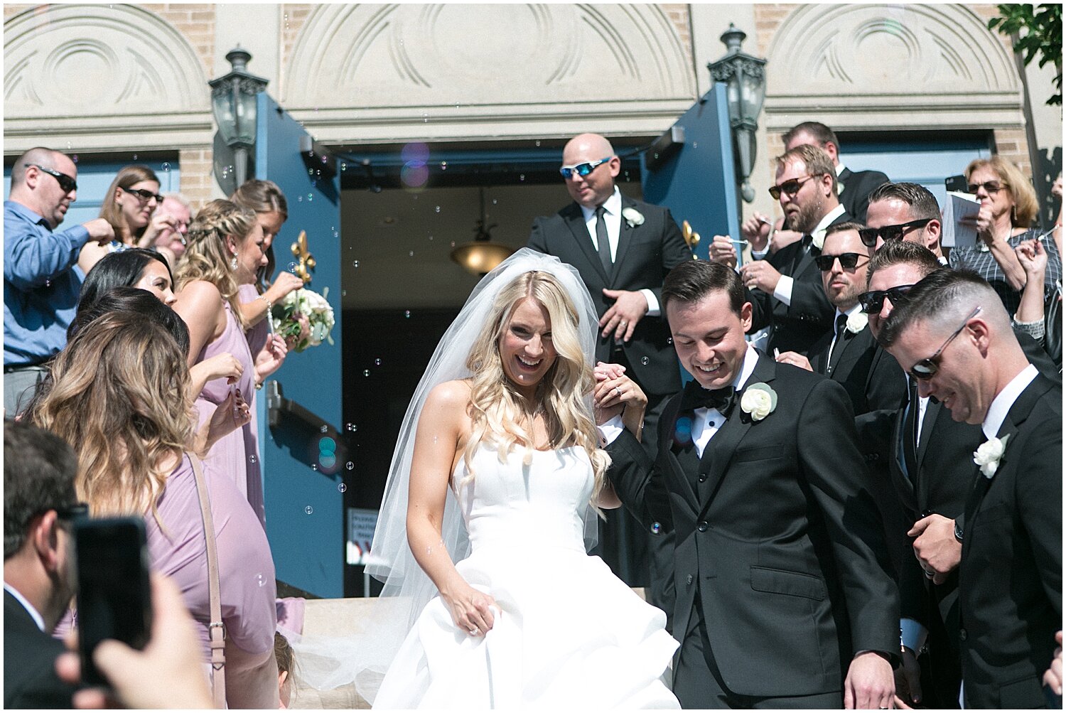  bride and groom’s grand exit from their wedding ceremony 