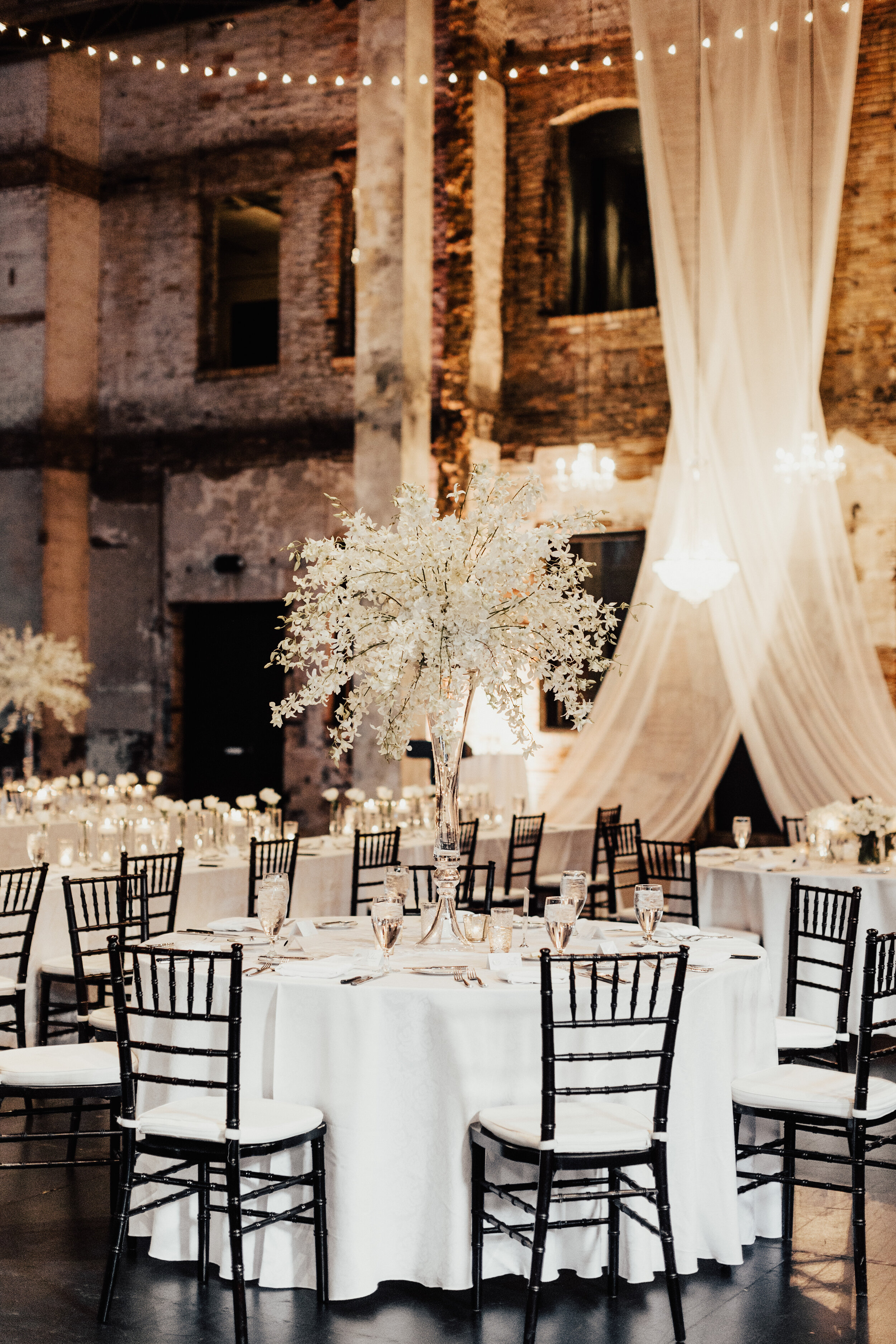  tall white centerpieces for wedding reception 