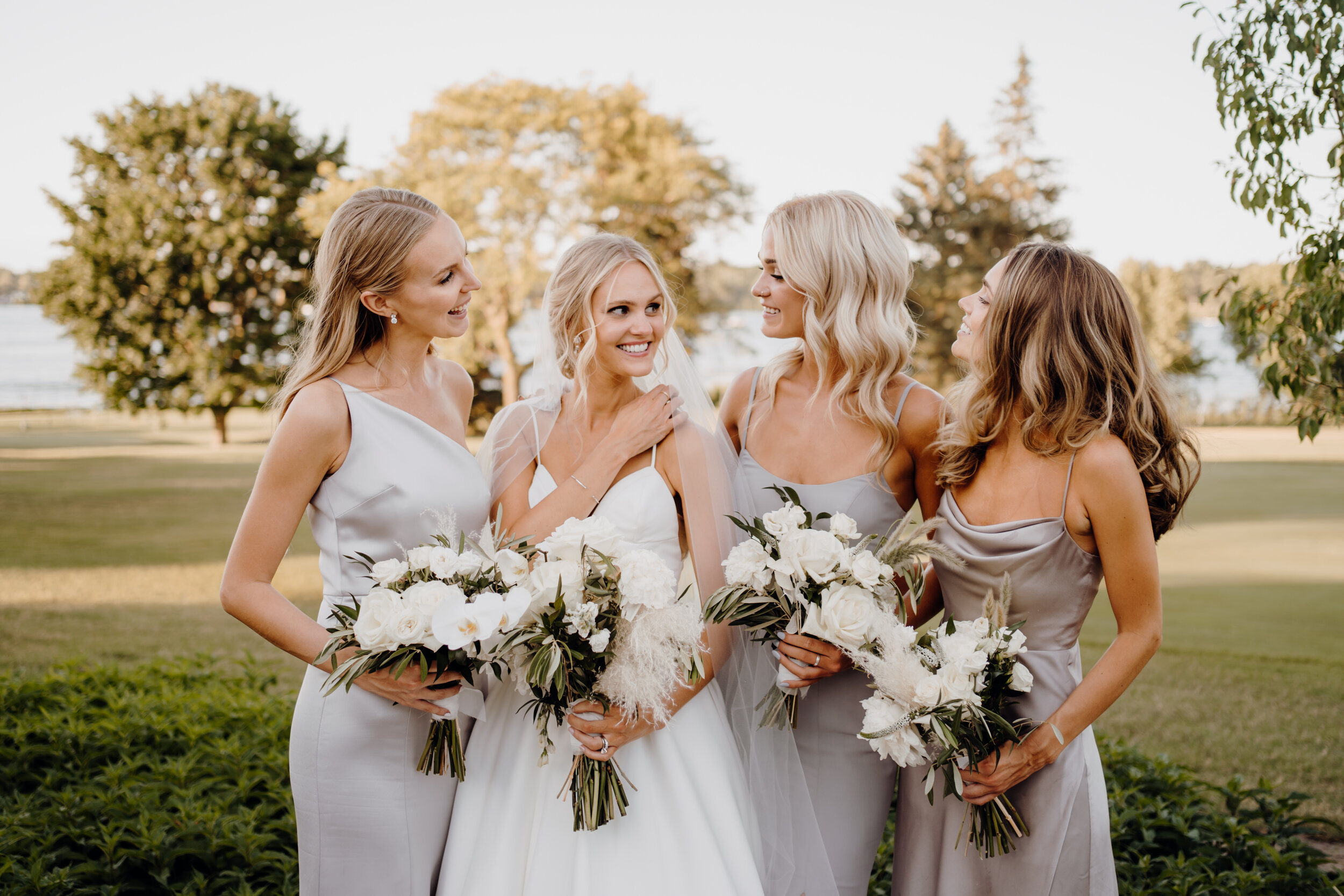  bride with her bridesmaids before her mpls wedding 