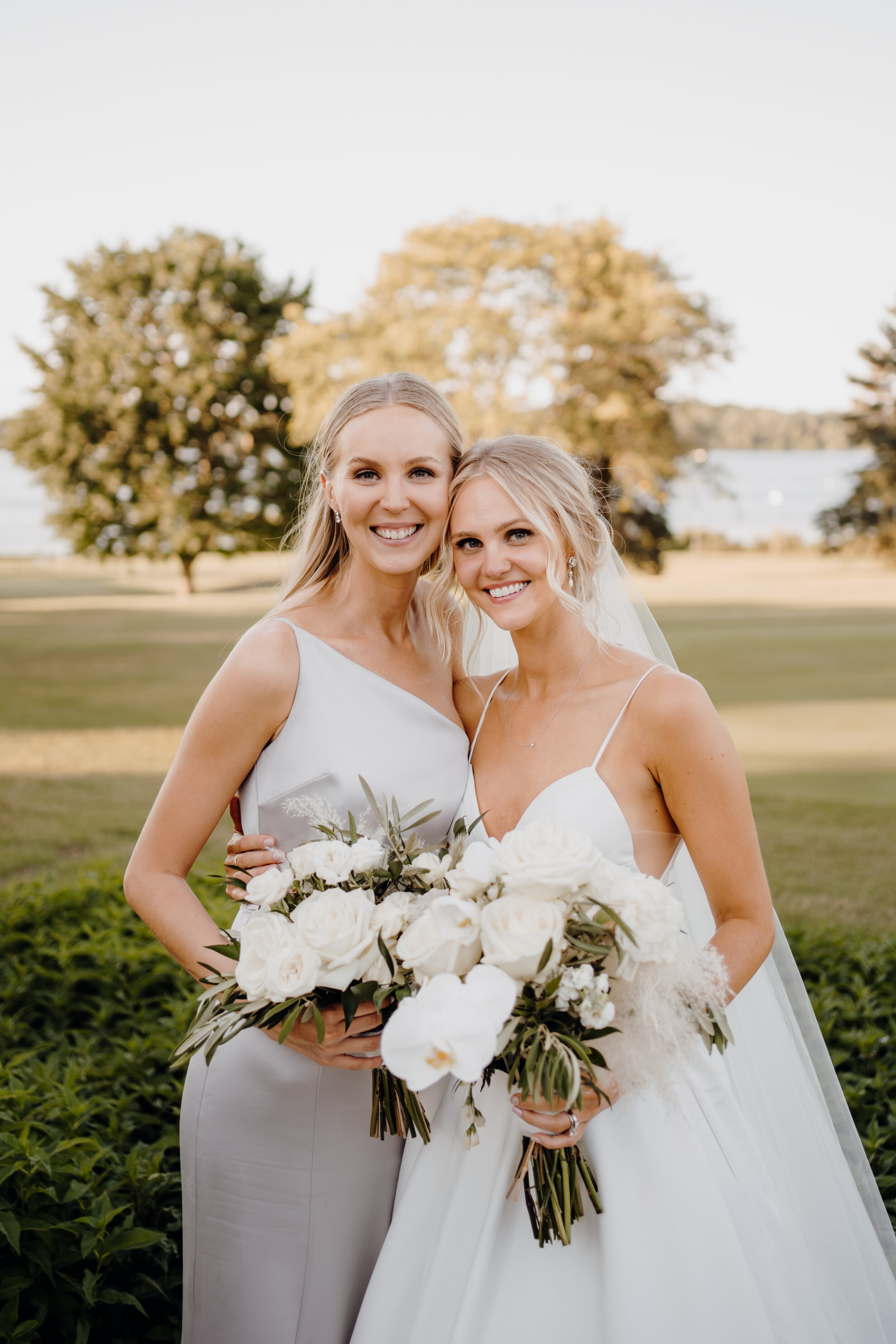  bride with her sister for mpls wedding 