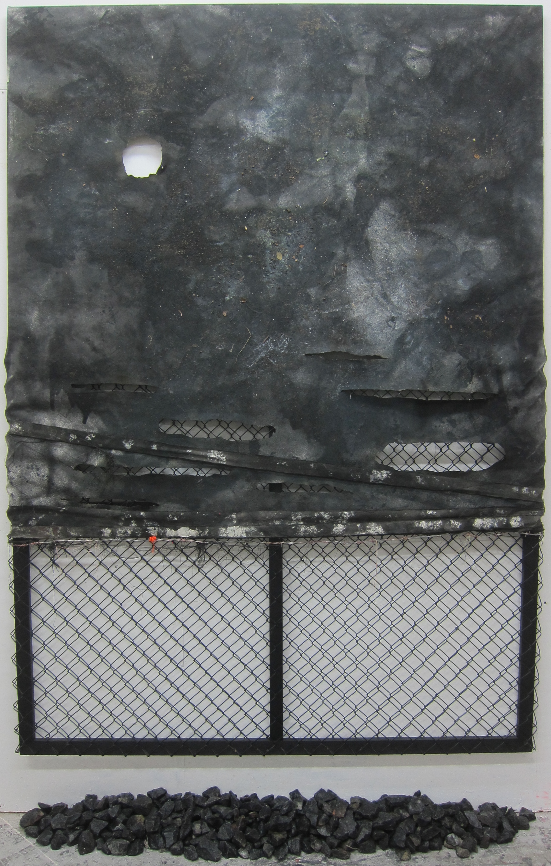   Trespass.   Alkyd resin, ink, soil, barbed wire, polyester, fence, granite, wood, cotton &amp; fire.&nbsp;  260 x 172 cm.  2015. 