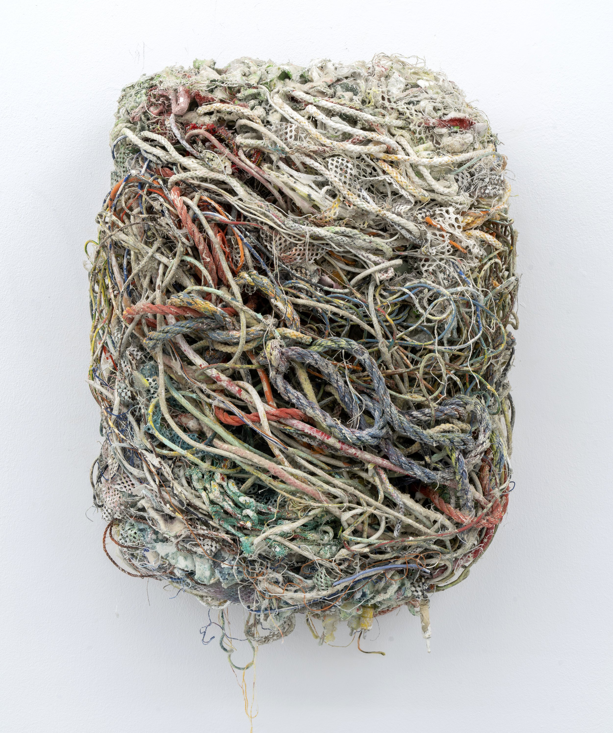   Entanglement   60 x 45 cm   Recovered electrical wires, fishing nets, ropes and studio detritus, bound to bedsprings  Part of the  You Turn Me Inside Out  solo exhibition at Fold Gallery, London 2022 