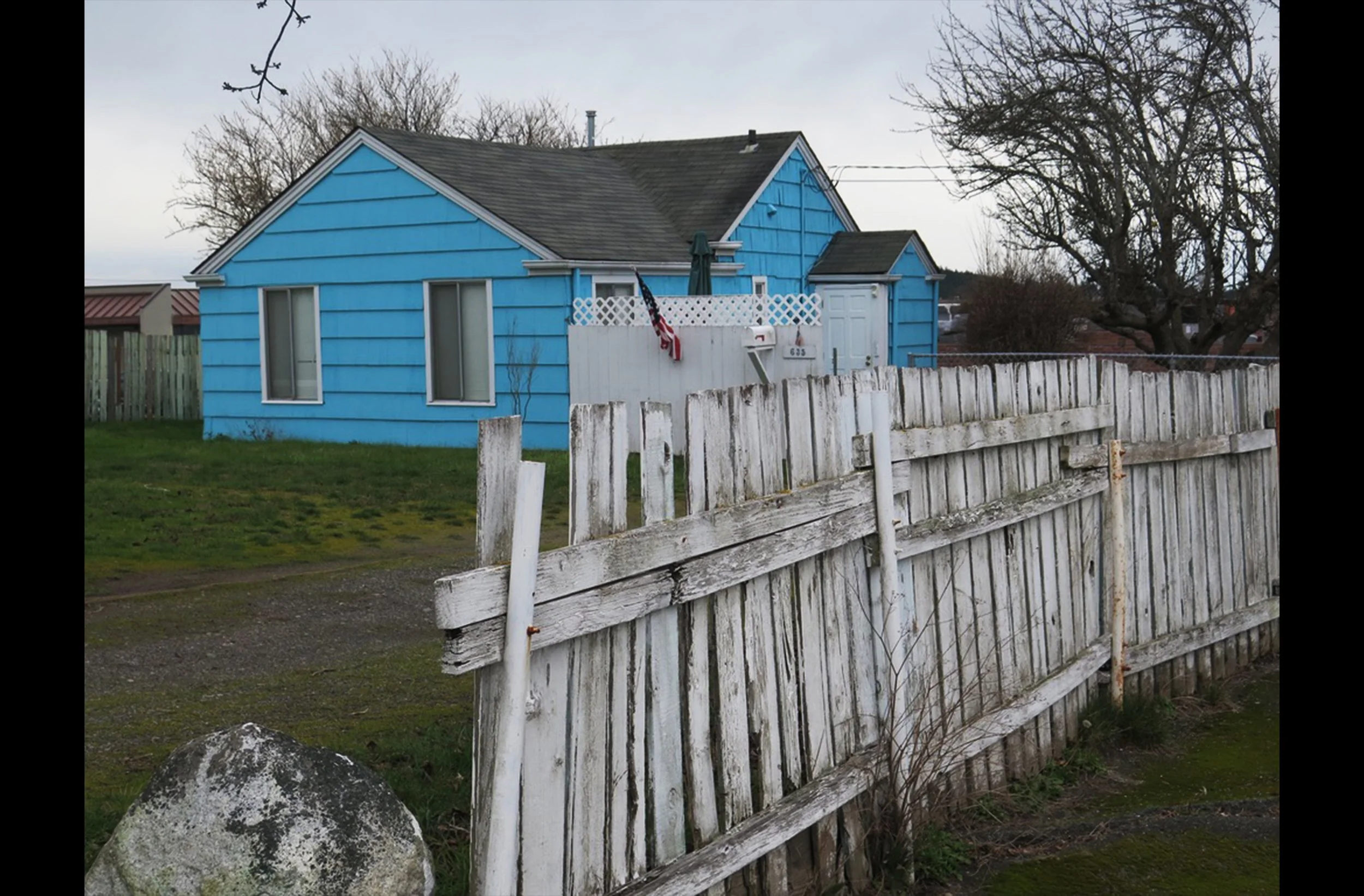 Blue House with American Flag