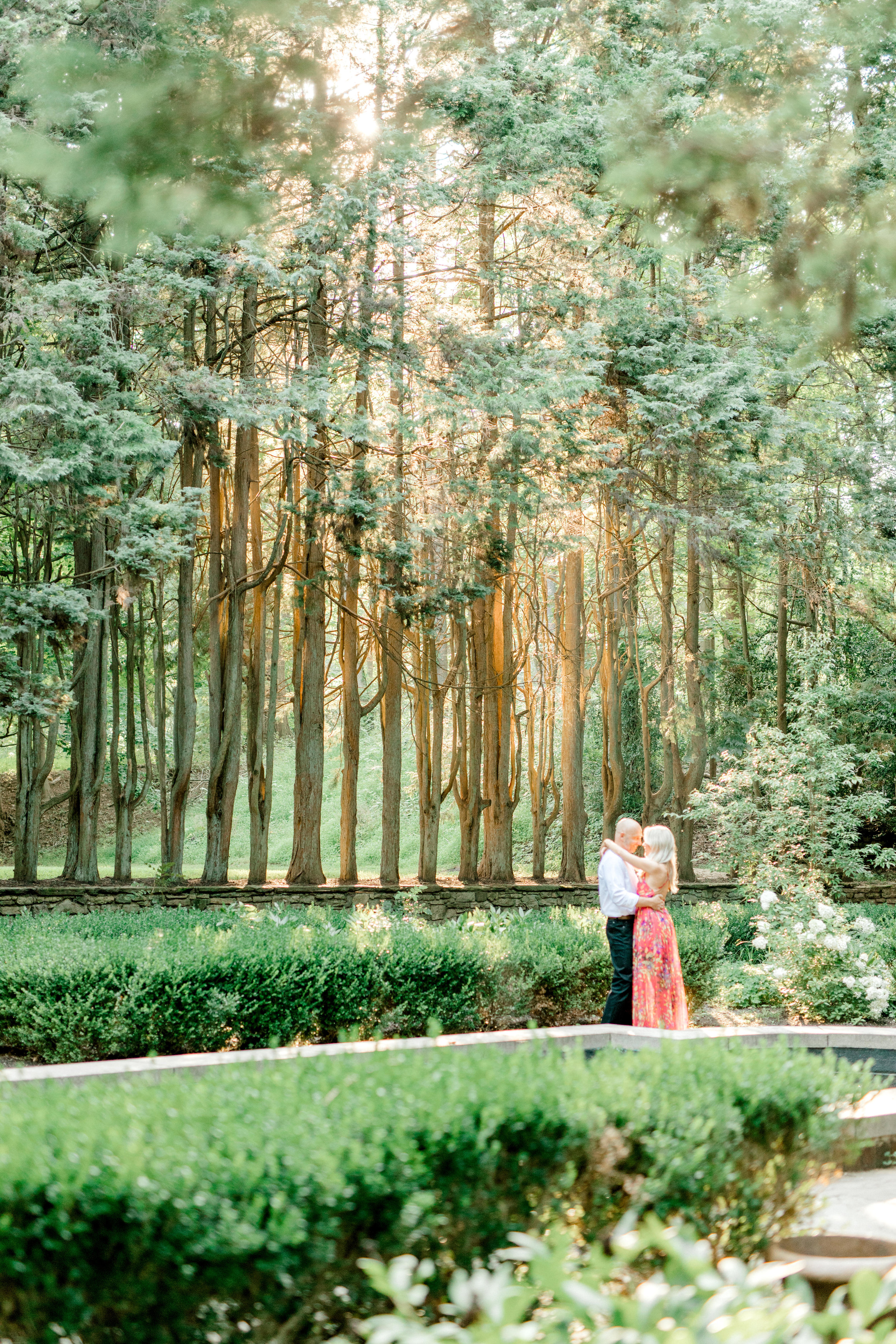 More of that glowing sun coming through the trees for Liz and Bill’s romantic woodland engagement session at Parque at Ridley Creek.