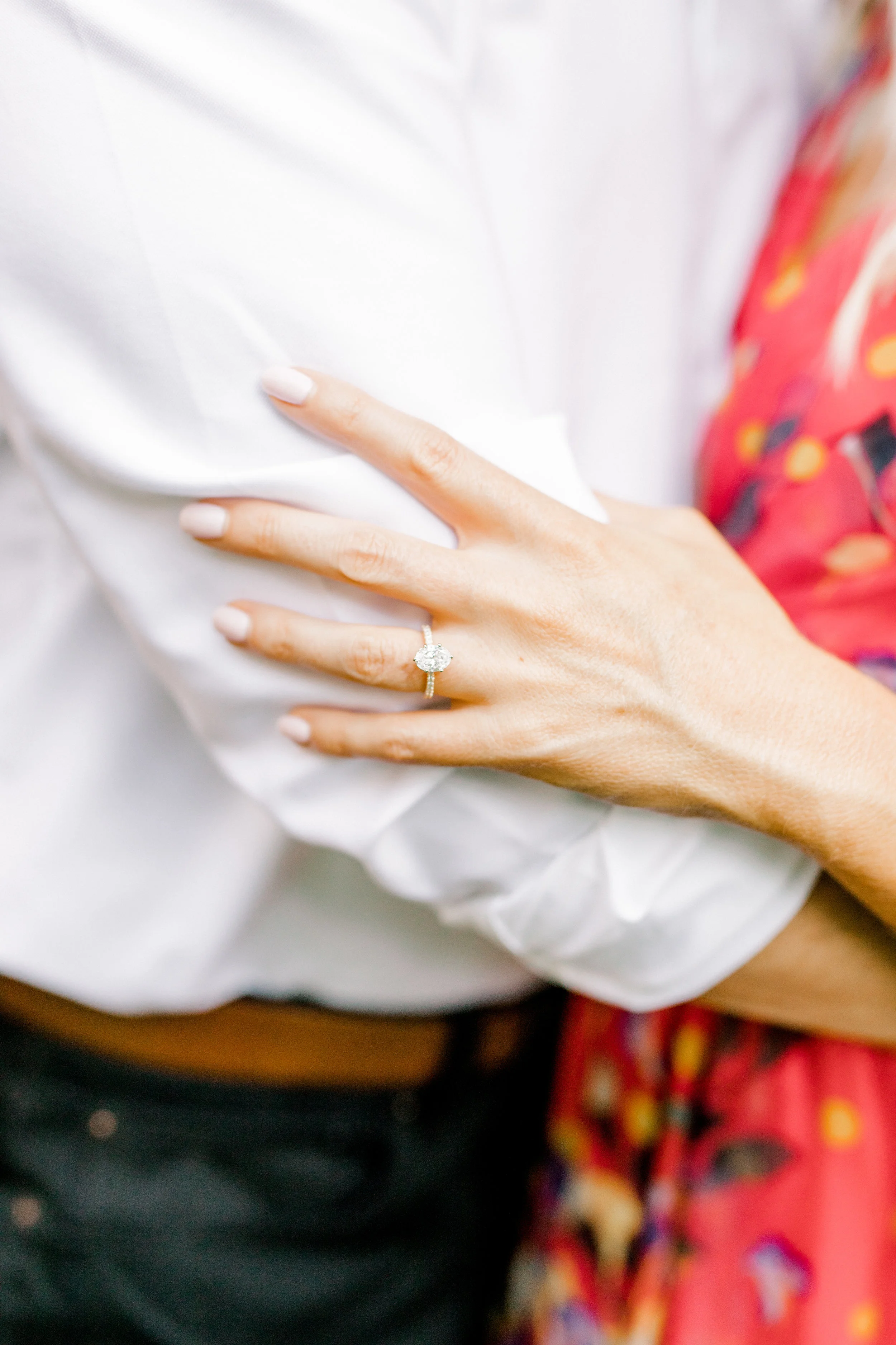 We love this modern oval diamond engagement ring with classic diamond band. It’s beautiful and elegant but still fresh.