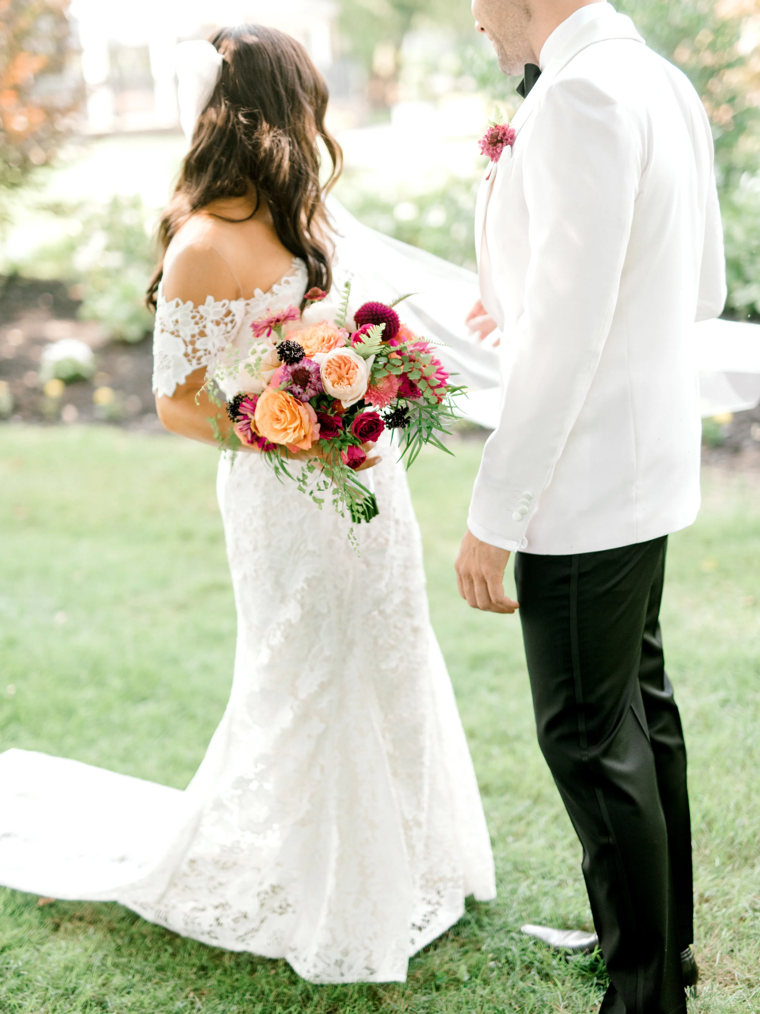 We absolutely adore this modern colorful flowers paired with the classic black and white look for this modern summer wedding at Hotel du Village.