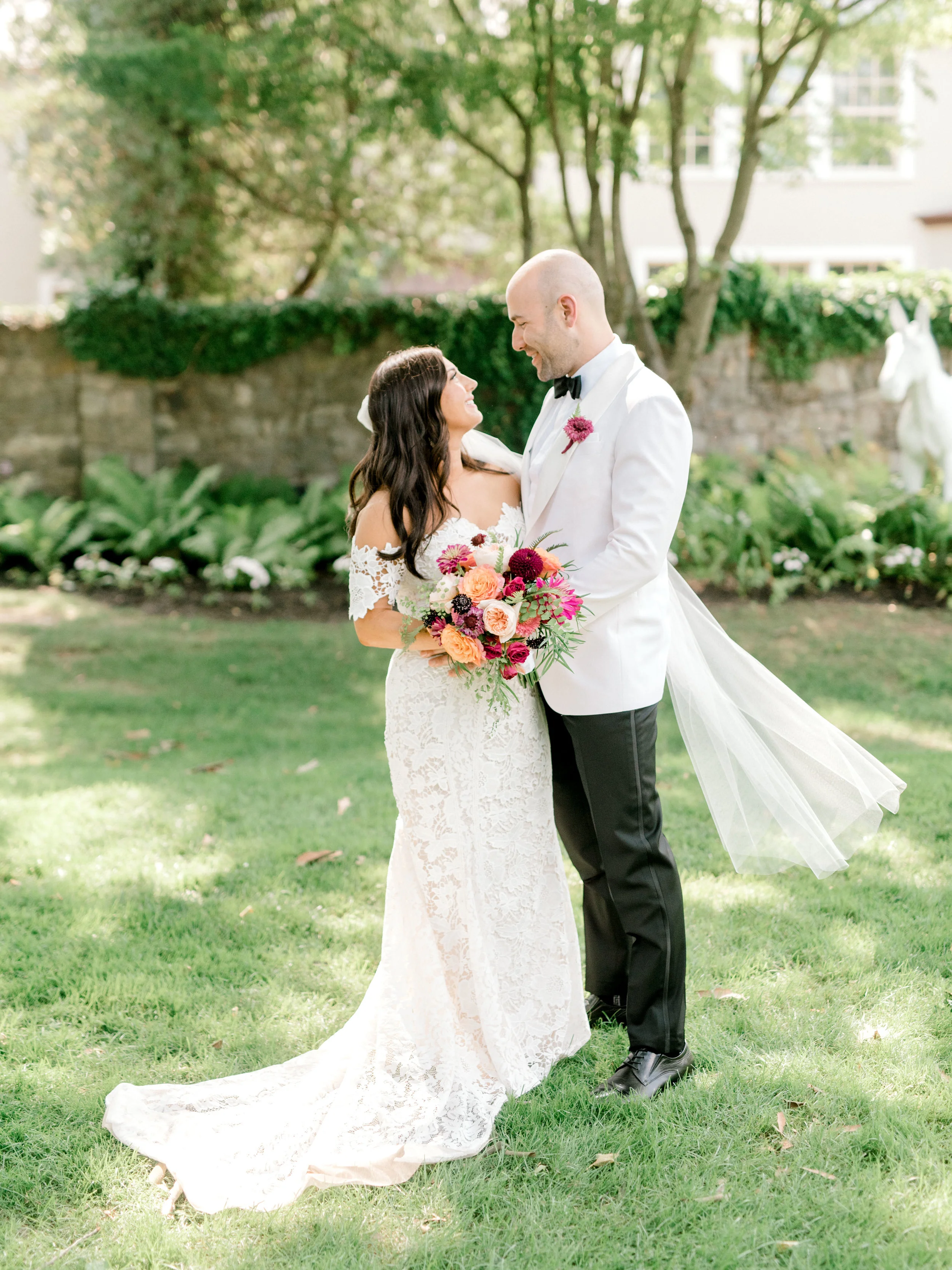 Lindsay and James made for the perfect combination of classic and modern with their black and white style and bright colorful flowers.
