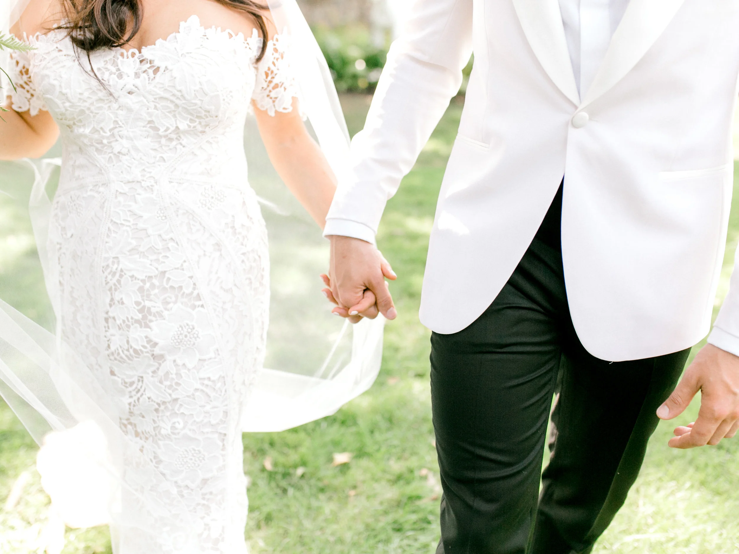 We loved the bright and modern look of whites mixed with bold pops of color for Lindsey and James’s summer wedding at Hotel du Village.