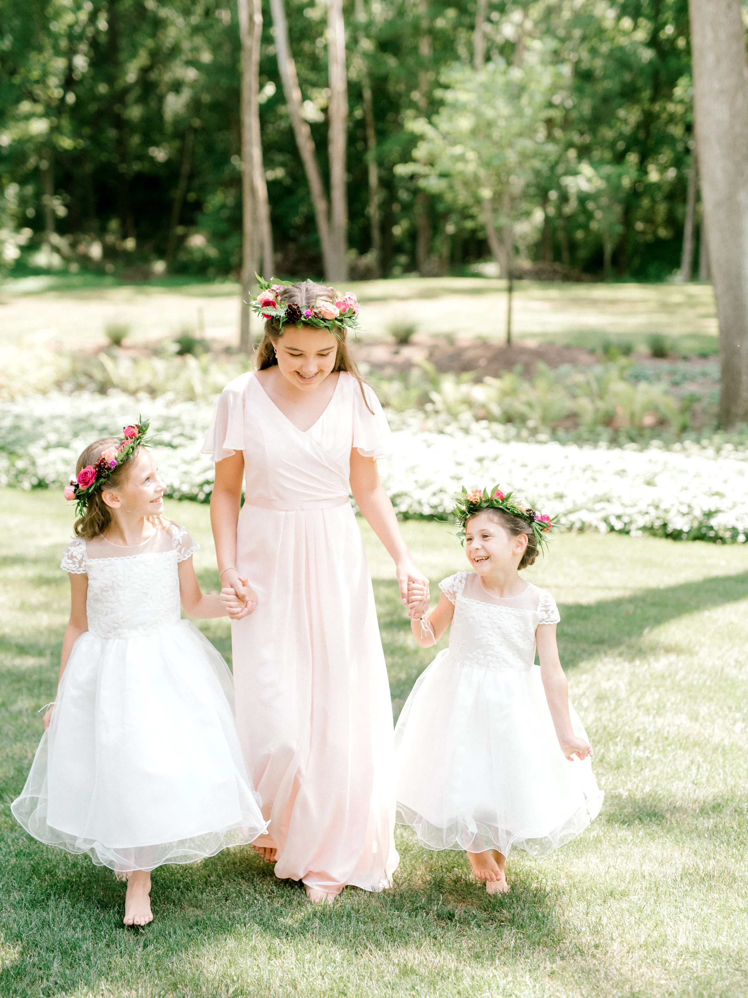 The prettiest little flower girls in pink and white for Lindsey and James’s bright and modern summer wedding at Hotel du Village.