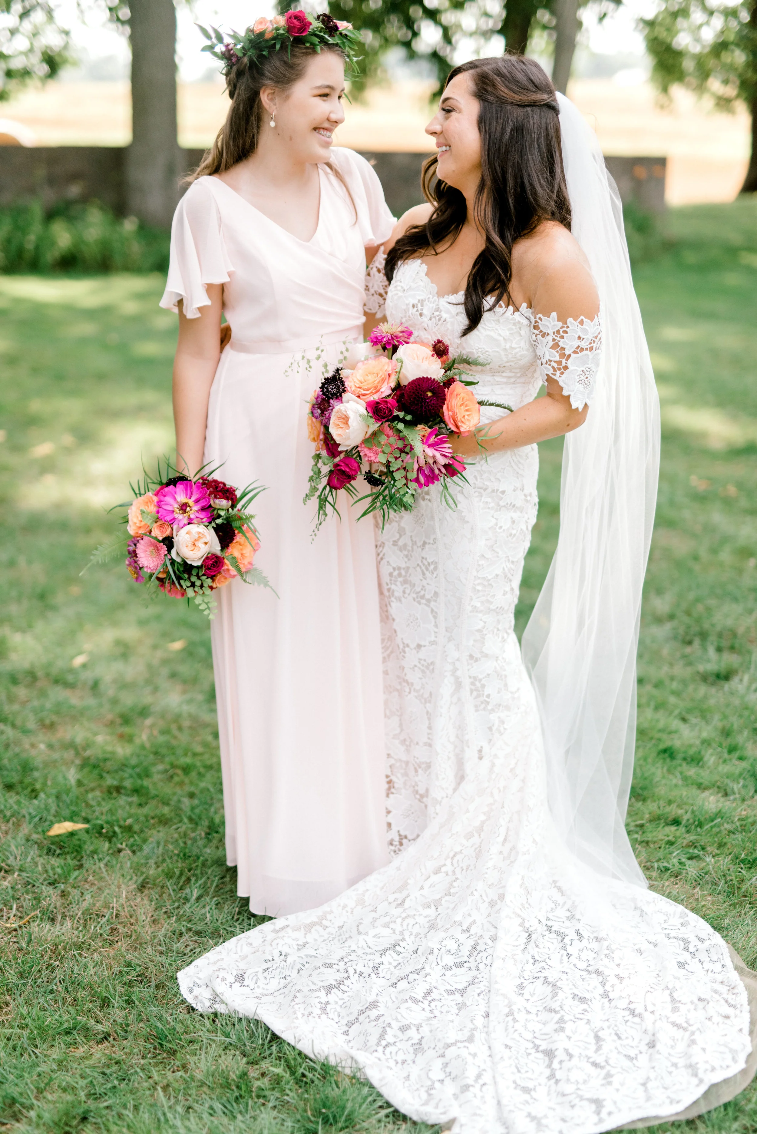 We loved the bright and modern look of whites mixed with bold pops of color for Lindsey and James’s summer wedding at Hotel du Village.