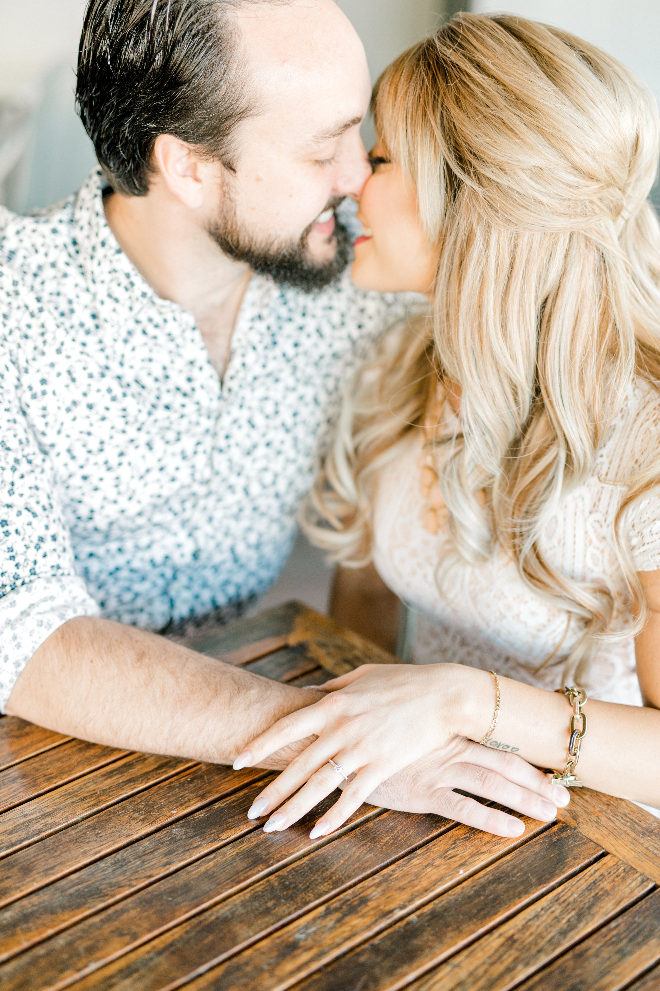 Nikki and Dale get close and romantic on the patio of the Revolution House in Old City, Philadelphia for their fall engagement session.