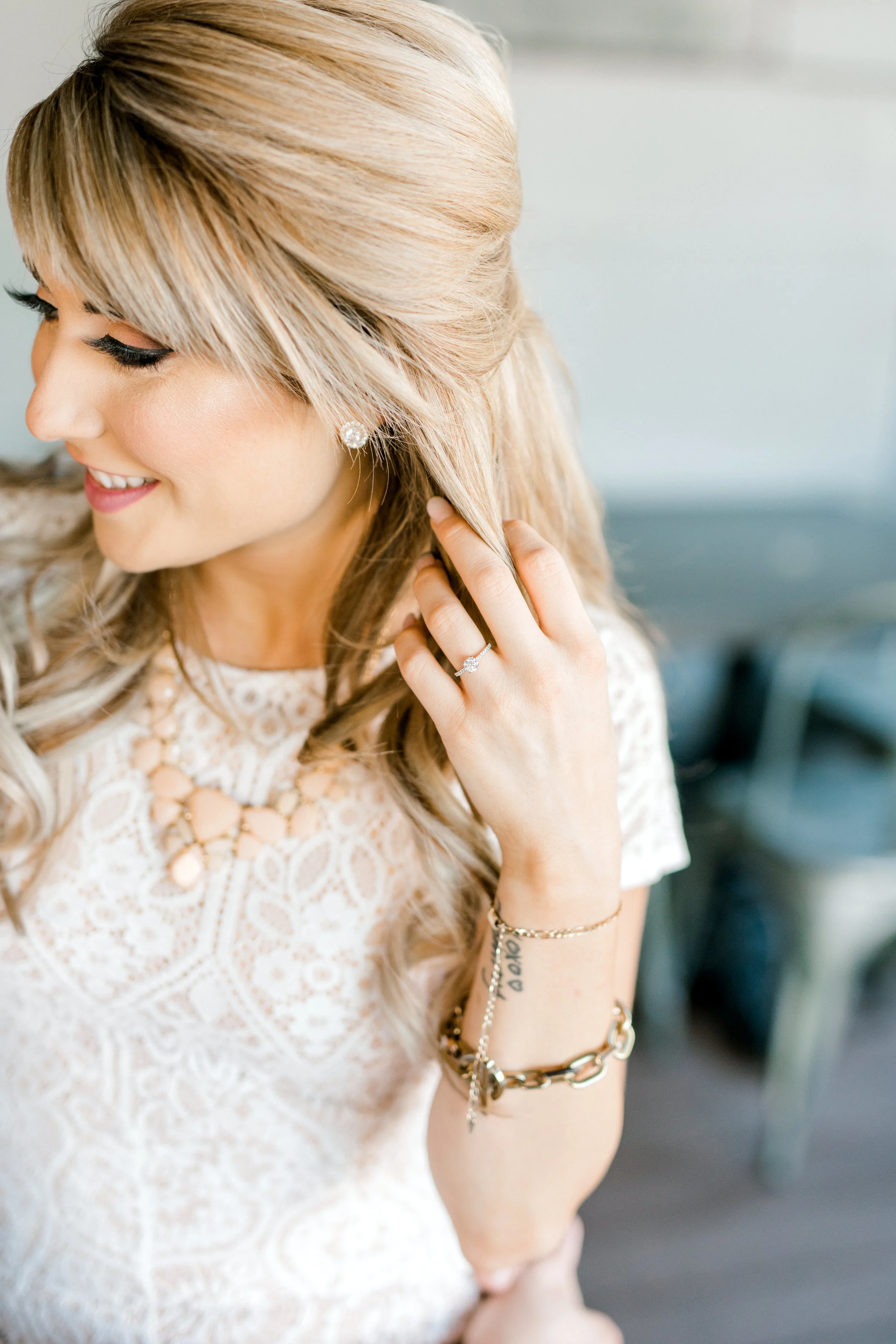 Nikki’s half up and half down hair perfectly complemented her sweet lace dress for her bright and romantic fall engagement session at the Revolution House in Old City, Philadelphia.