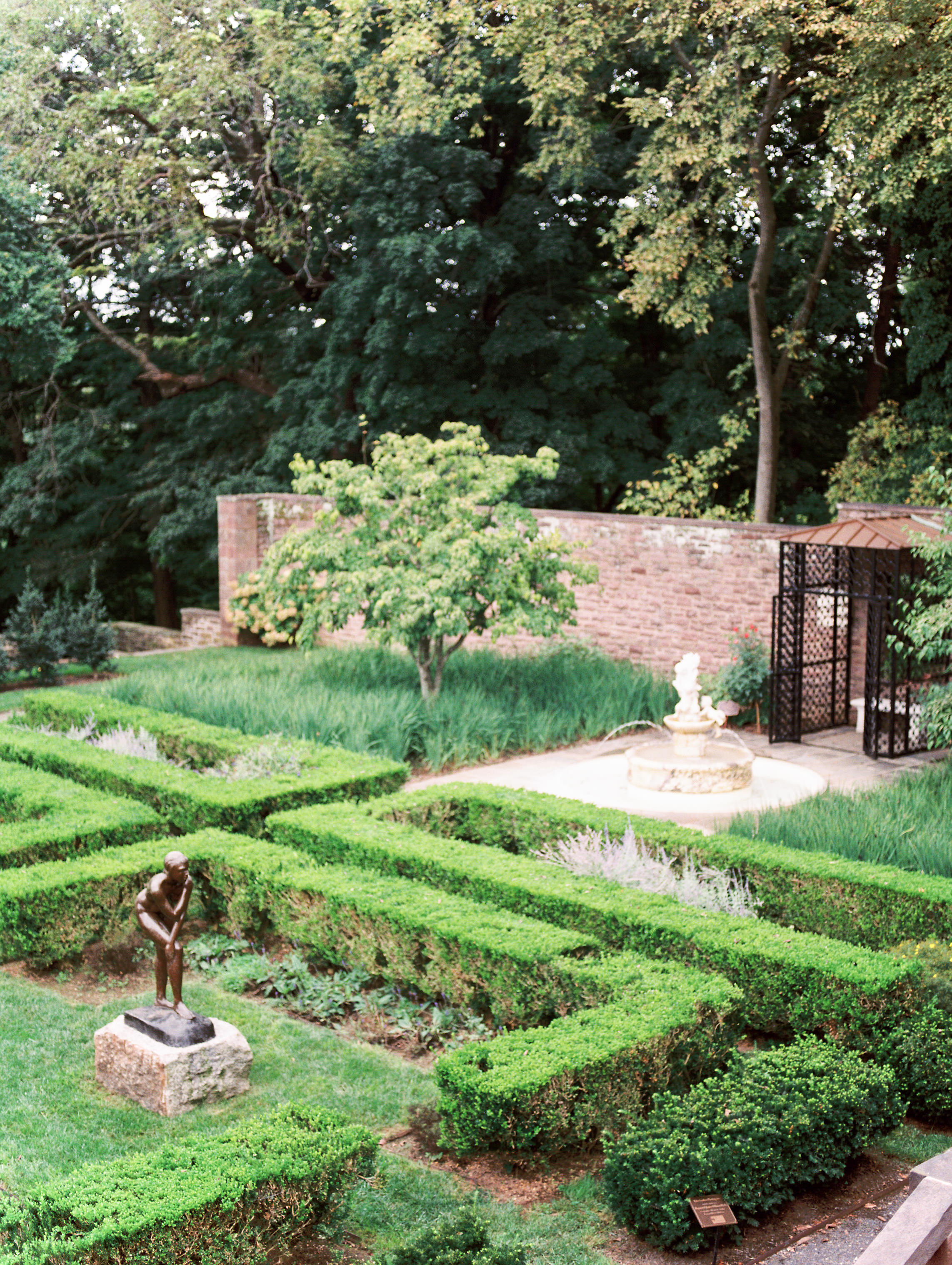 We loved how we felt like we were in France with the sculpted garden greenery from this bright boho chic Tyler Gardens wedding in Bucks County