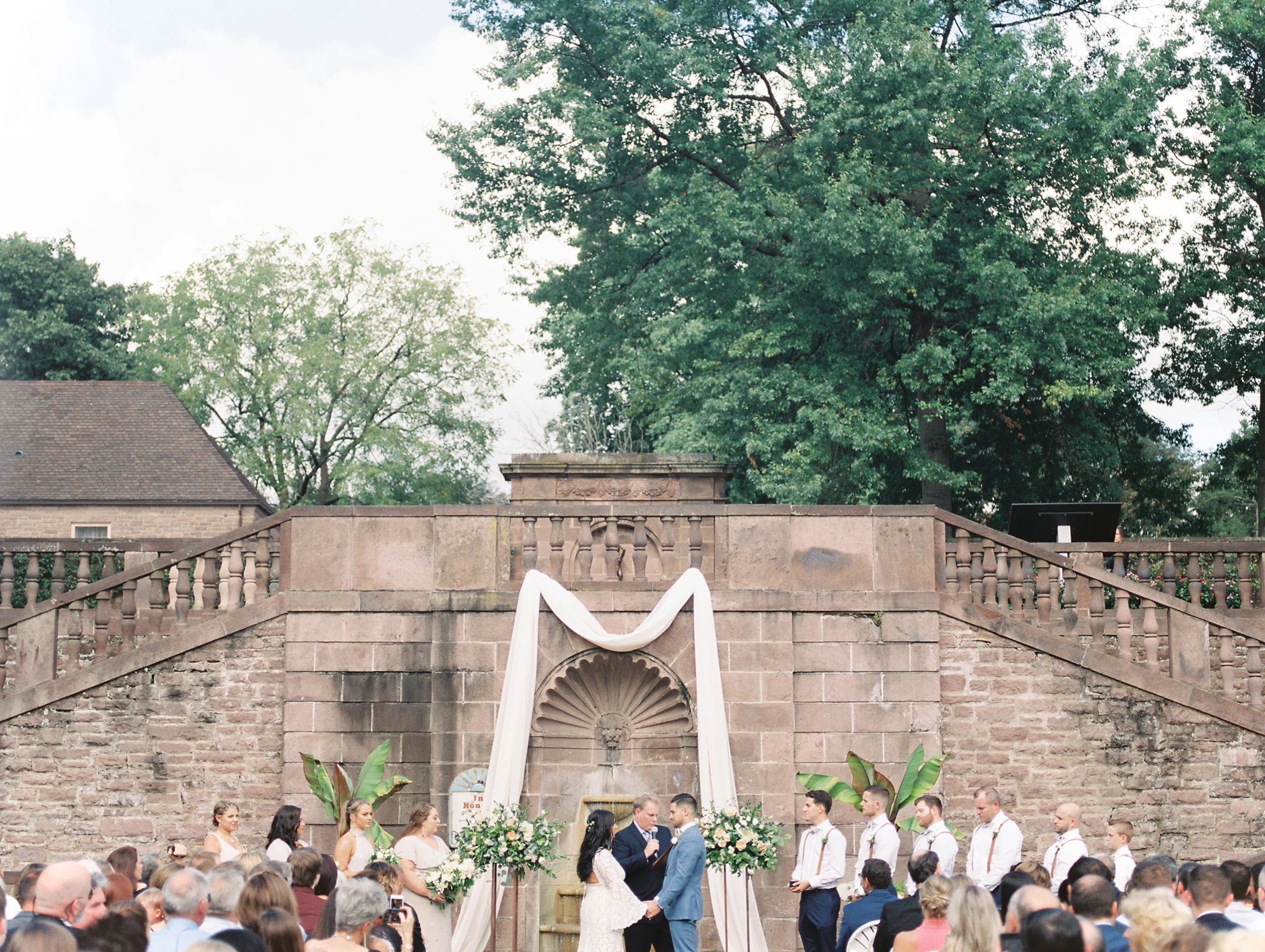 We simply adored the European vibes from the stone walls and architecture of this garden ceremony from Alicia and Mike’s bright boho chic Tyler Gardens wedding in Bucks County