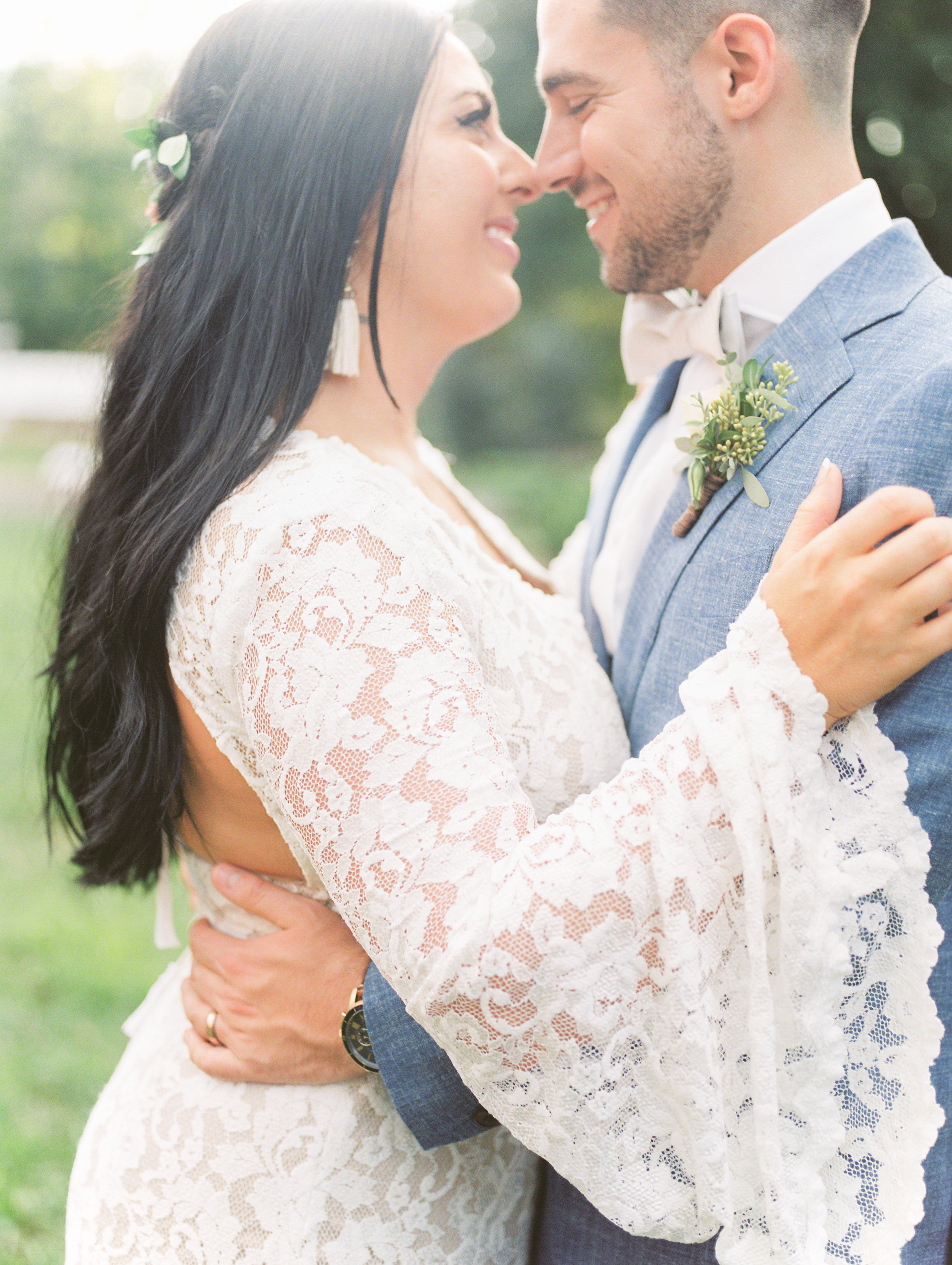 Check out the draped bell sleeve on this hippy lace BHLDN gown from this bright boho chic Tyler Gardens wedding in Bucks County