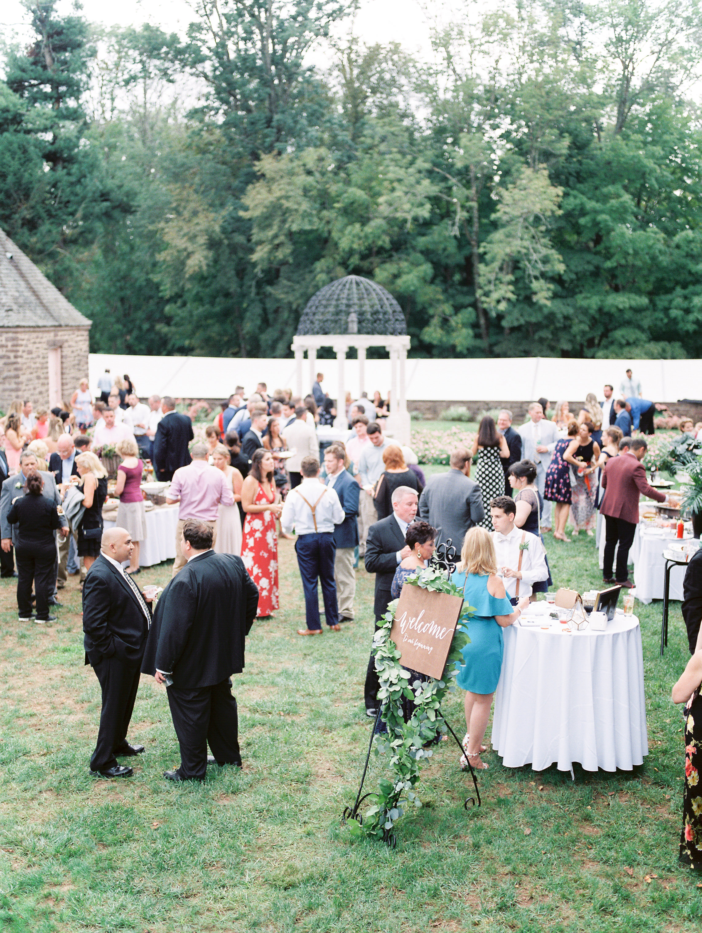 Cocktail hour in the garden is the right way to do it, we got all the European vibes from this bright boho chic Tyler Gardens wedding in Bucks County