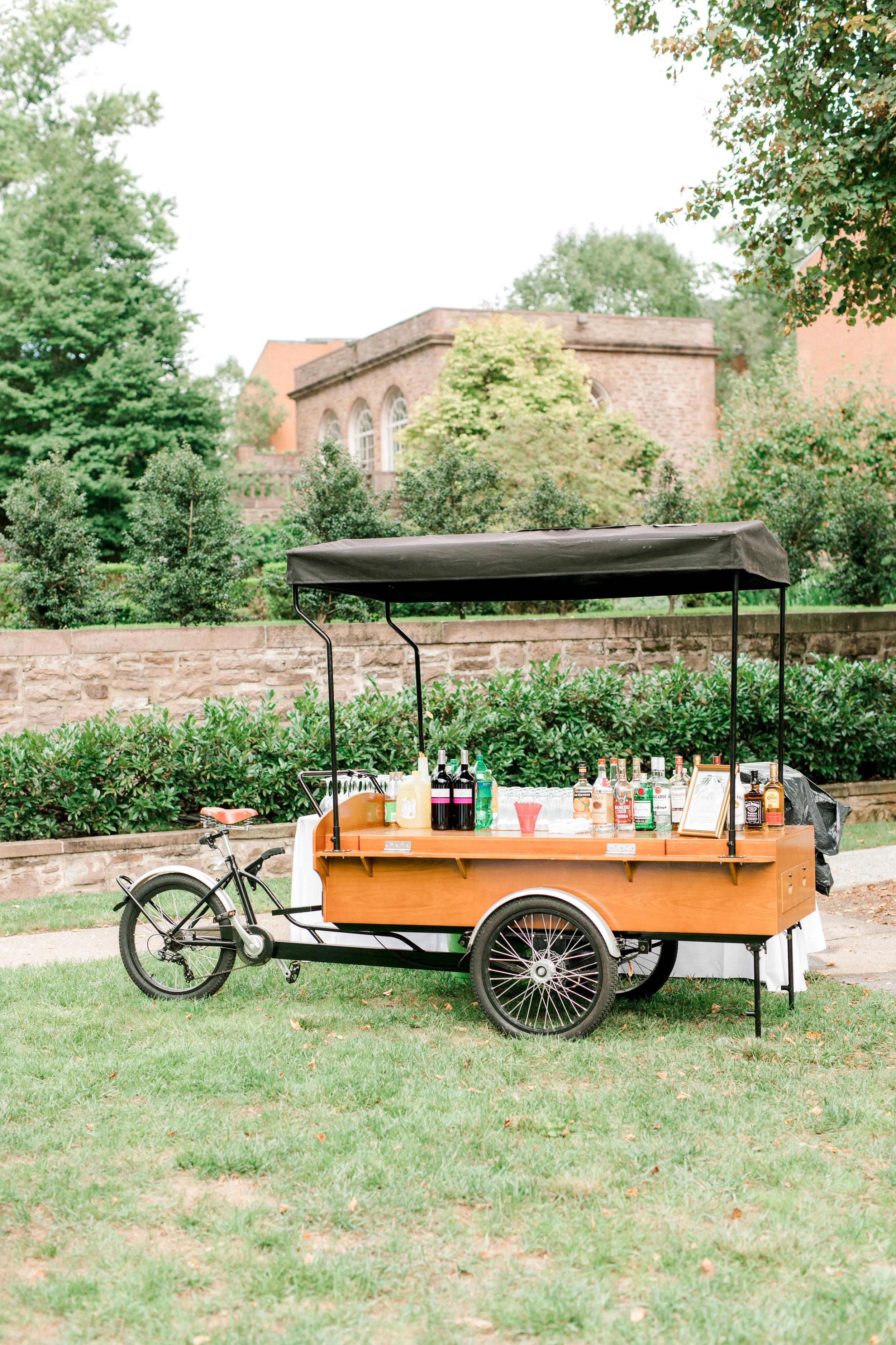 A vintage beverage cart that could be straight from Italy from this bright boho chic Tyler Gardens wedding in Bucks County